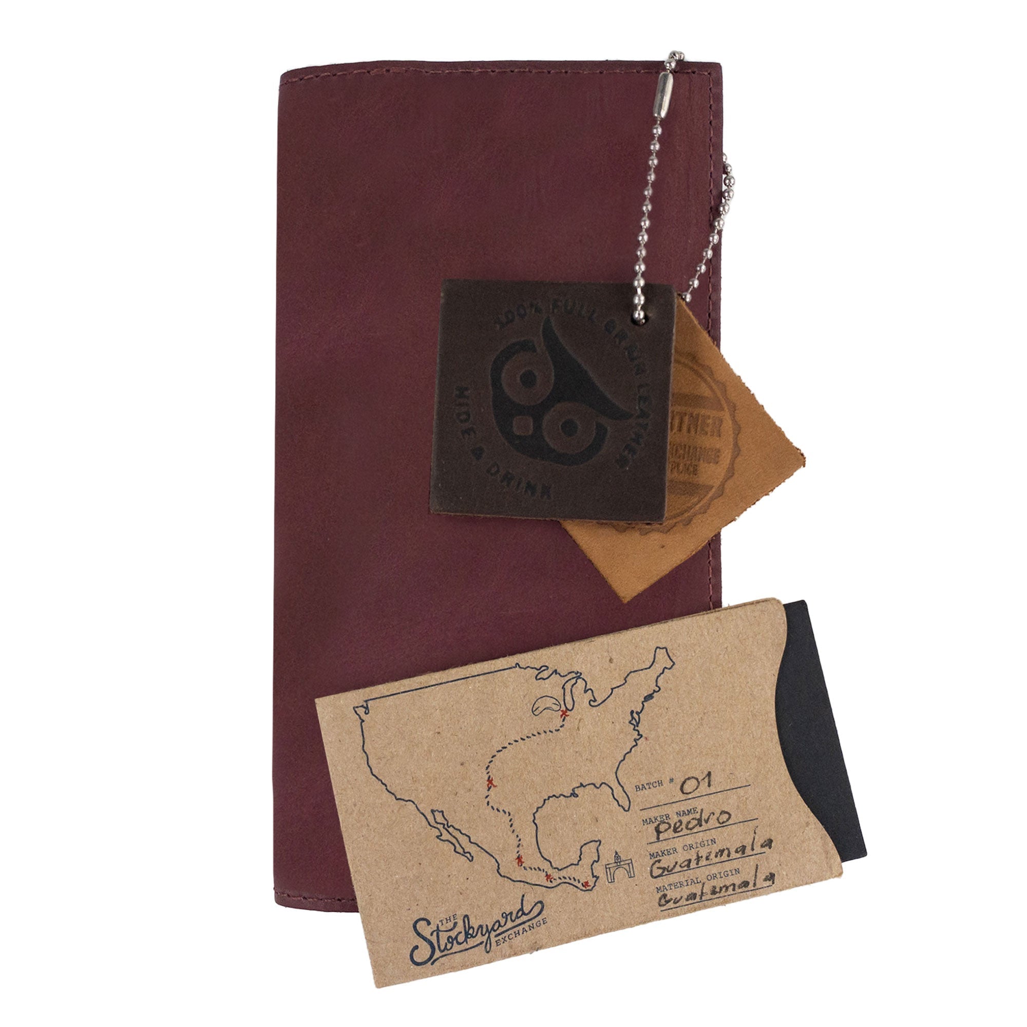 Detailed view of the Checkbook Leather Cover by Hide & Drink, featuring its elegant design as a minimalist organizer for standard checkbooks. This artisan product is handmade from full grain leather in La Antigua Guatemala and Oaxaca Mexico, emphasizing small batch production.