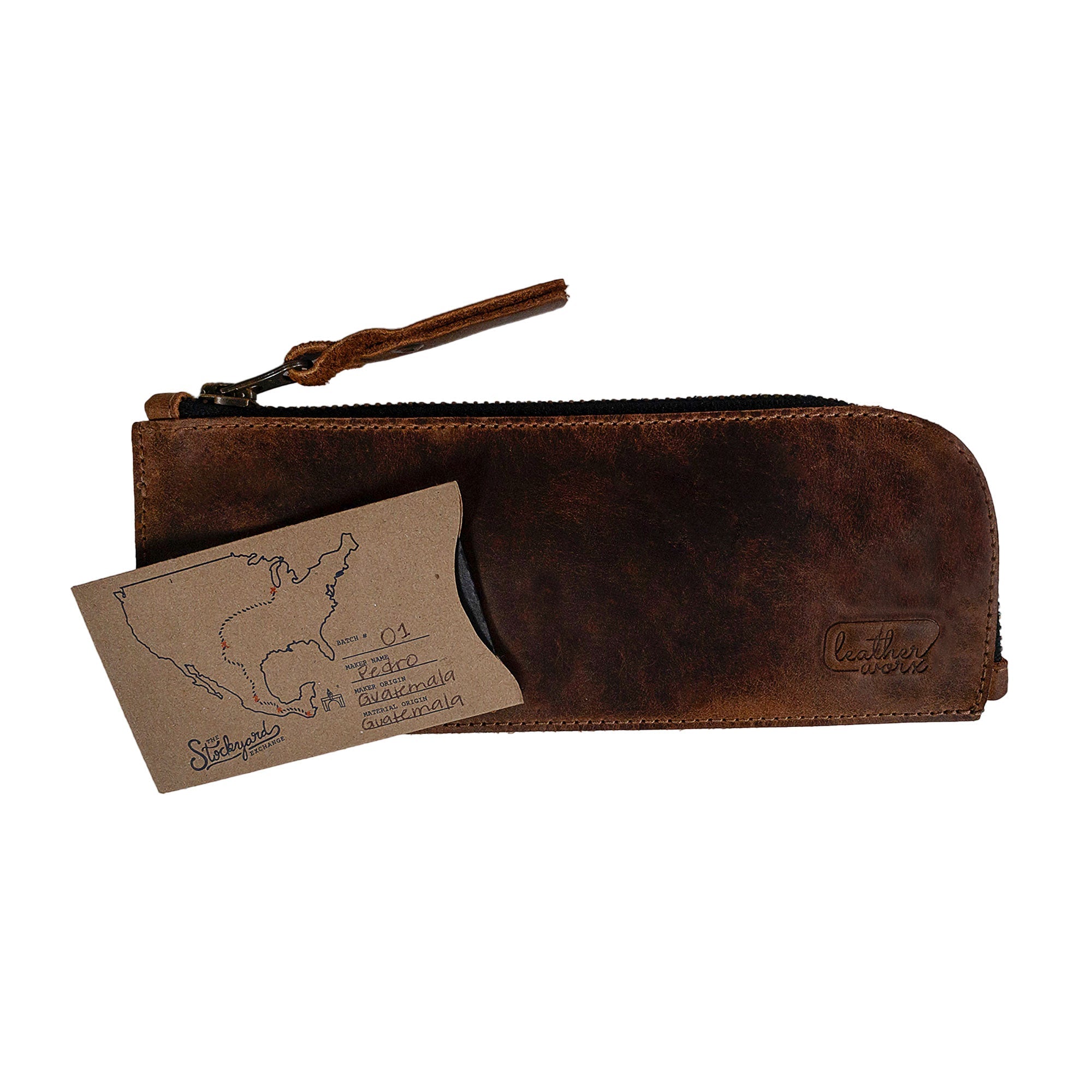 Leather Worx Flat Pen Case alongside a care card, highlighting the quality assurance of this artisan product. Made from full grain leather, it's the perfect flat pencil pouch and an excellent gift option, crafted in La Antigua Guatemala & Oaxaca Mexico, emphasizing small batch production and hand-sewn durability.