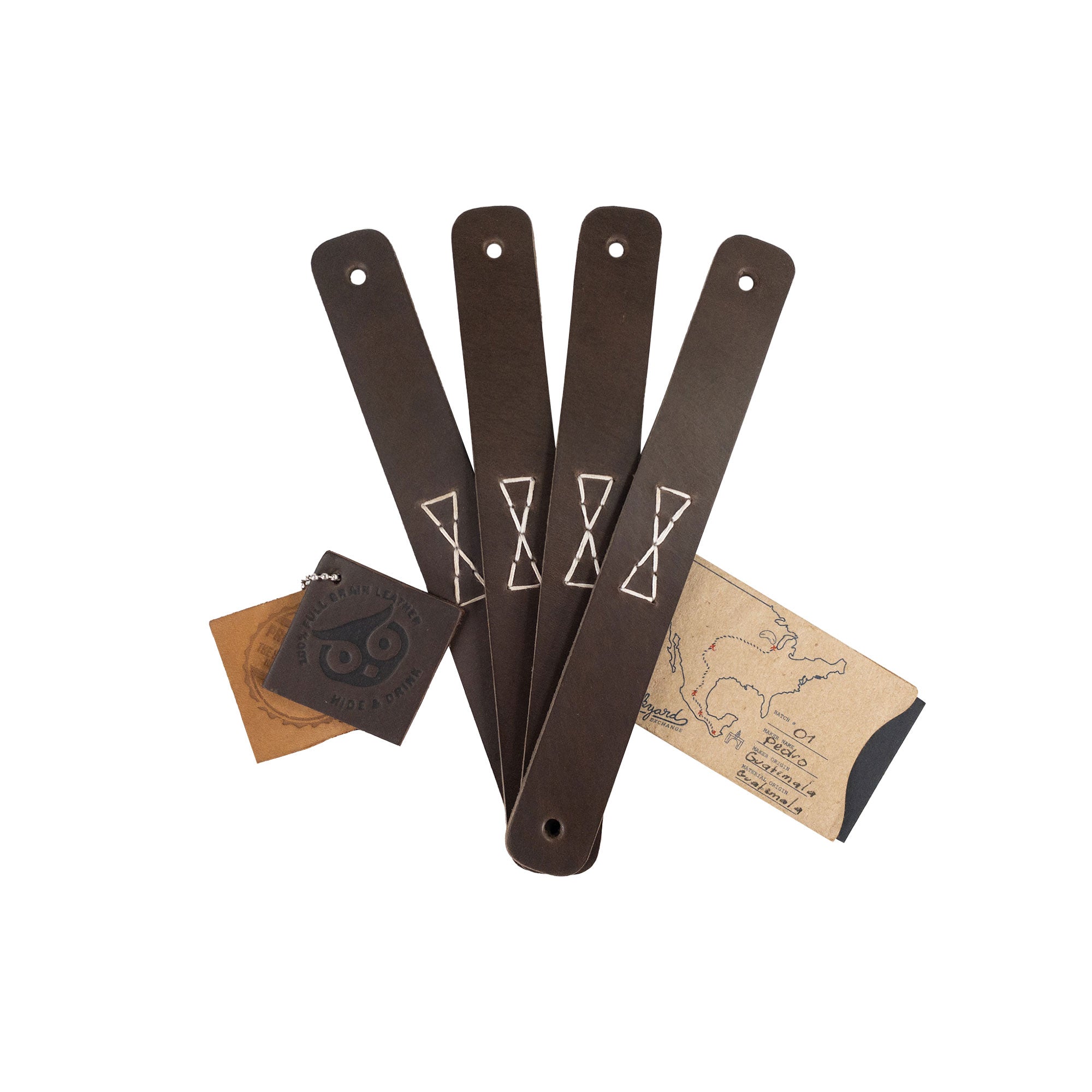 A complete set of Rectangular Drawer Handles with Bowtie Stitching Design packaged by Hide & Drink. This 4 Pack, made from full grain leather, highlights small batch production and artisan quality from La Antigua Guatemala & Oaxaca Mexico.