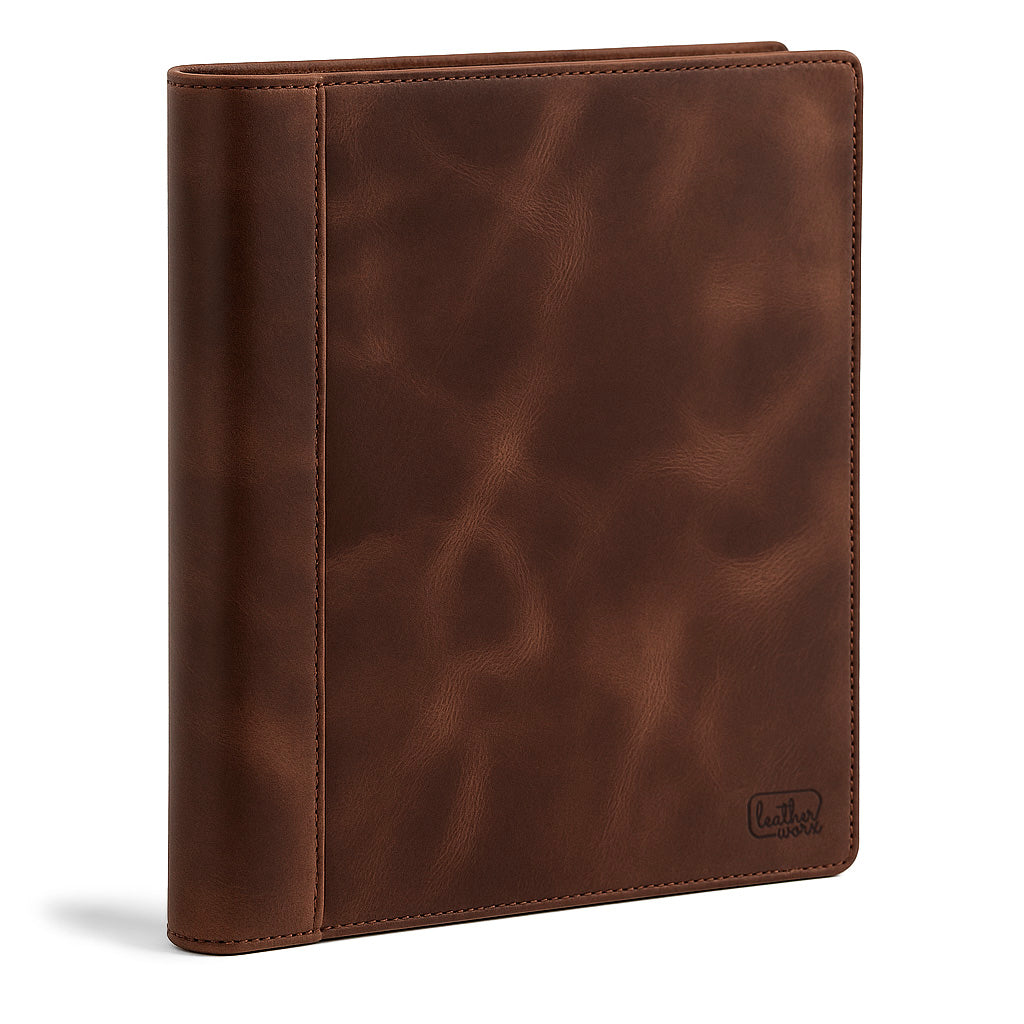 A classy binder cover showcasing a rich brown full grain leather finish by Leather Worx. This professional case serves as an excellent office accessory, emphasizing minimalist style. Each binder cover is handmade in La Antigua Guatemala with artisan craftsmanship, featuring small batch production, hand cut and hand sewn details, and a fire branded logo.