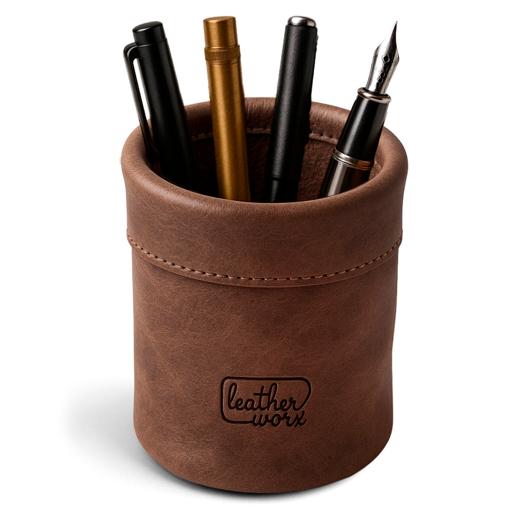 Leather Worx Pen Organizer featuring a stylish design with assorted pens and pencils inside. This Pen Organizer Cylinder Pencil Holder is perfect for work and school, made from Full Grain Leather, showcasing small batch production, artisan craftsmanship, and handmade quality from La Antigua Guatemala & Oaxaca Mexico.