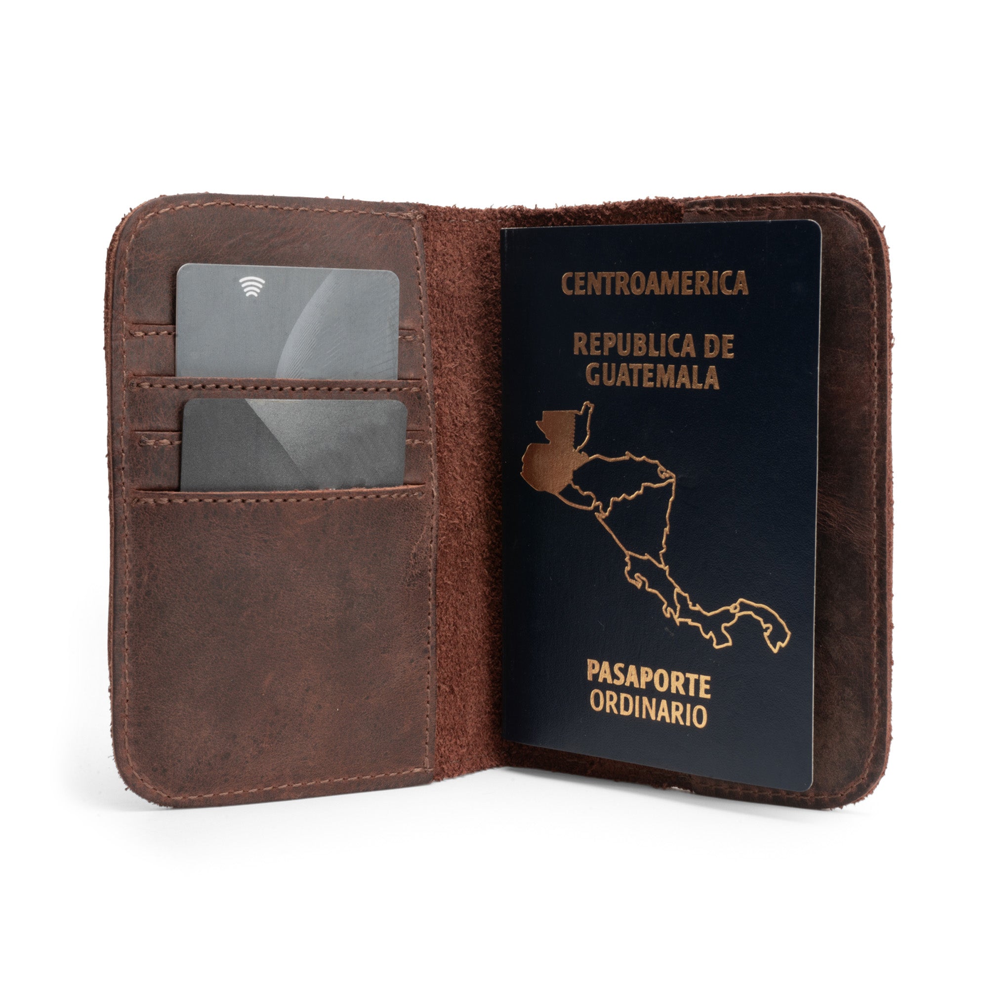 Inside view of the Hide & Drink Travel Wallet, showcasing the bifold design with card slots, perfect as a passport case and money holder for travel accessories. Made from full grain leather, artisan crafted in La Antigua Guatemala.
