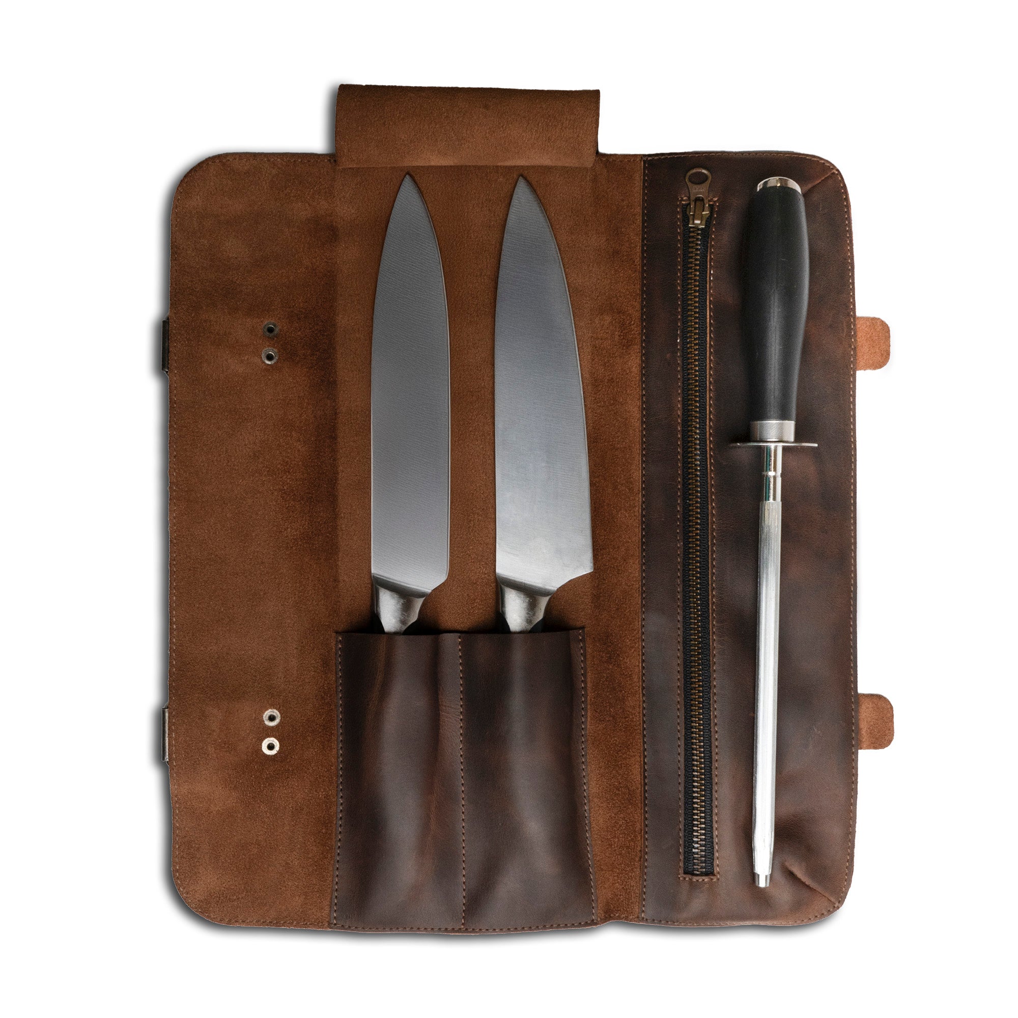 Open Utility Knife Roll from Cast Leather Co. showing a rectangular roll for cutting essentials with two knives and a sharpener. Crafted from full grain leather, this knife case includes an extra bag for cooking accessories, highlighting the small batch production, hand cut, hand sewn, and fire branded artisan techniques of handmade goods from La Antigua Guatemala.