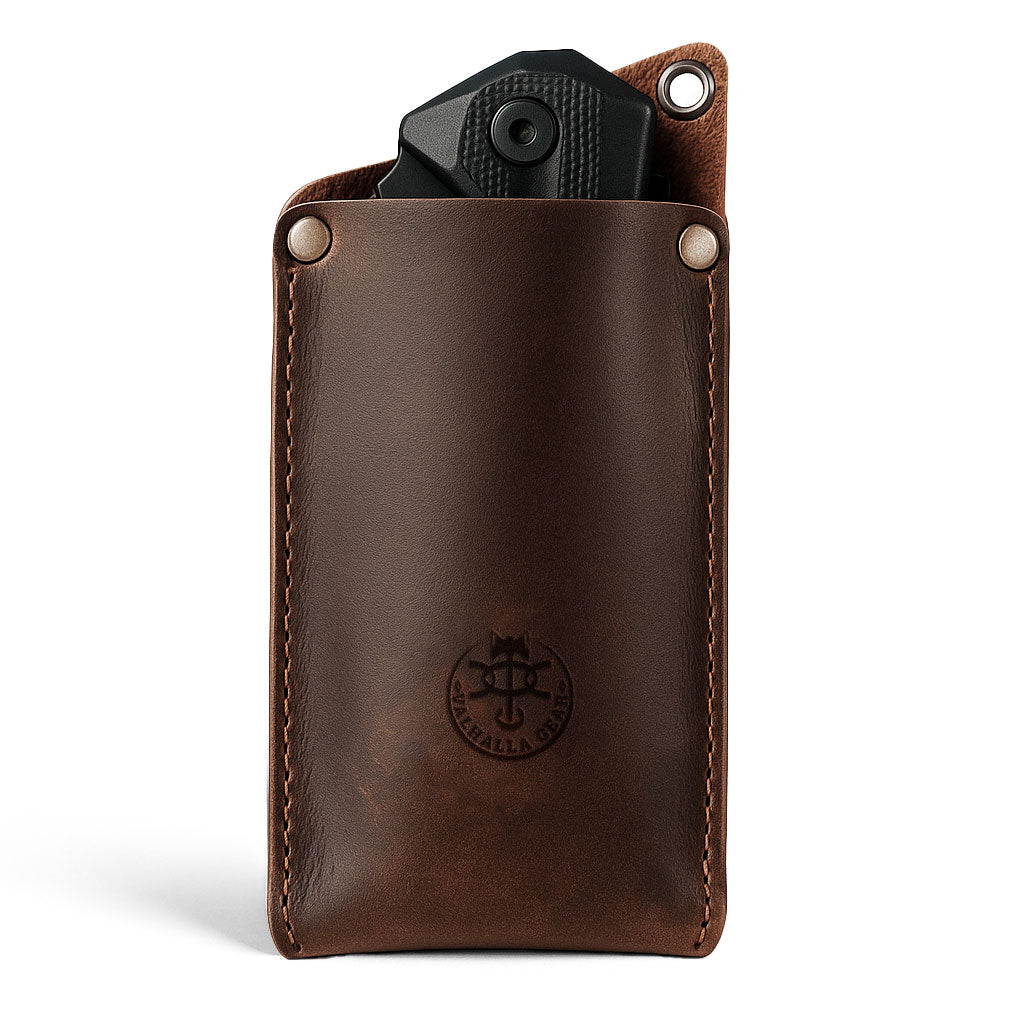 Valhalla Gear EDC Knife Sheath showcasing a full grain leather rectangular knife sheath, designed as a vertical holster for multitools, ideal for camping and outdoor accessories. Handmade in La Antigua Guatemala, this artisan product is hand cut, hand sewn, and fire branded for durability, reflecting small batch production craftsmanship.