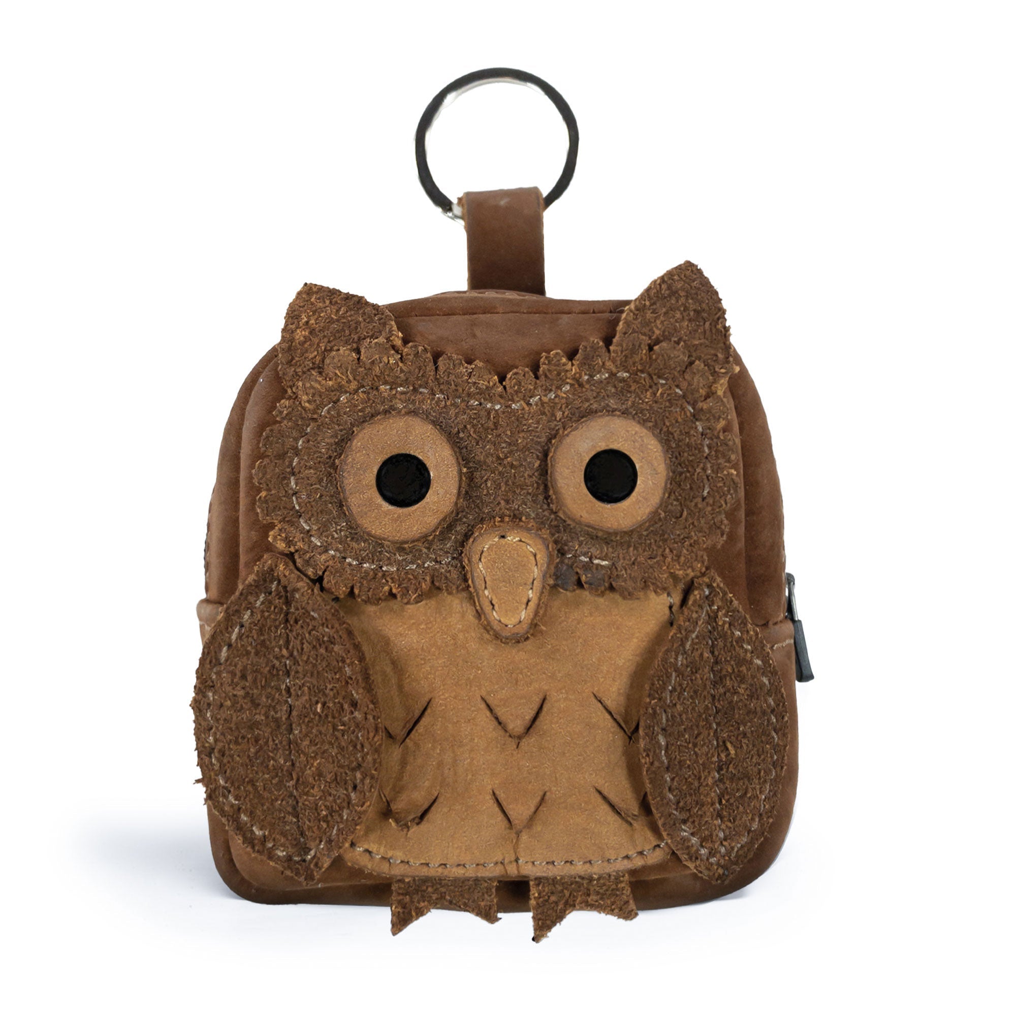 Owl Mini Backpack by Hide & Drink, featuring a charming owl design, is perfect as an Owl Mini Backpack Coin Purse or Cute Keychain. This owl-shaped case for cables, coins, and small items is crafted from Full Grain Leather, showcasing small batch production. Each piece is hand cut, hand sewn, fire branded, and proudly made by artisans in La Antigua Guatemala & Oaxaca Mexico.