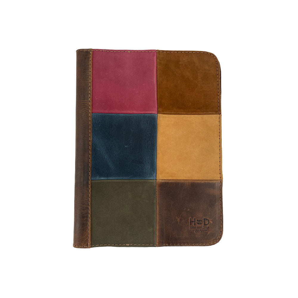 Front view of the dark brown leather Full Grain Leather Journal Cover for Moleskine Cahier XL (7.5 x 9.75 in.) by Hide & Drink with a timeless design. Ideal for writing enthusiasts appreciating handcrafted quality.