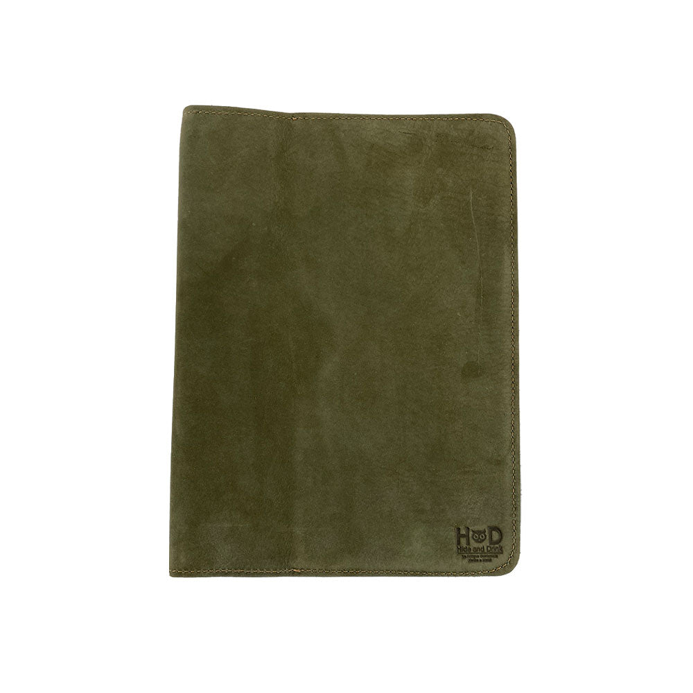 Open view of the interior of the olive green Full Grain Leather Journal Cover for Moleskine Cahier XL (7.5 x 9.75 in.) by Hide & Drink, featuring a contrasting bookmark. This handmade notebook sleeve reflects artistry and care from every aspect of production.