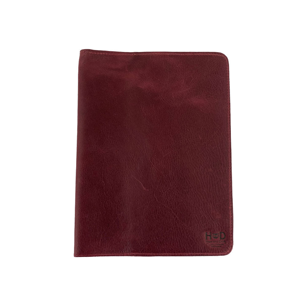 Front view of the brown leather Full Grain Leather Journal Cover for Moleskine Cahier XL (7.5 x 9.75 in.) by Hide & Drink, offering a classic yet stylish appearance. A must-have for writers who enjoy handcrafted items.