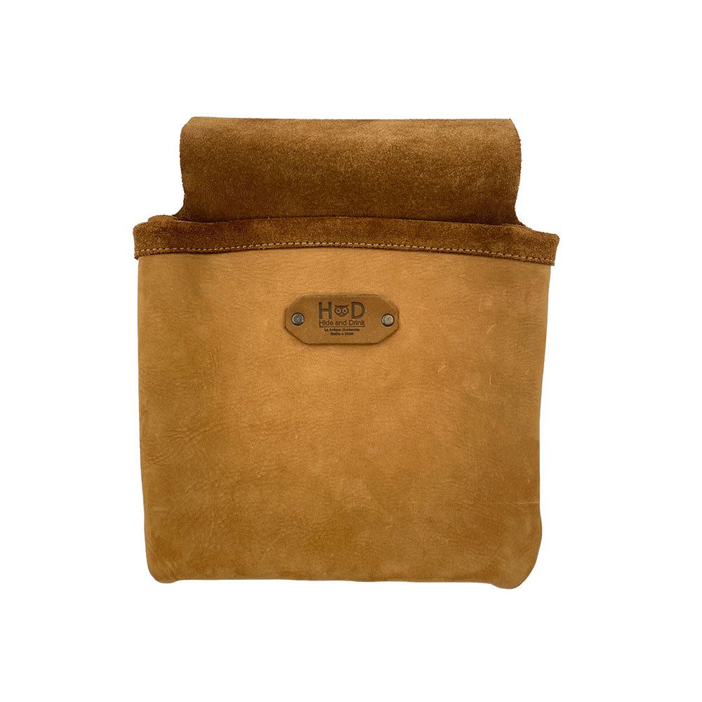 Front view of the Constructor Belt Bag in tan by Hide & Drink, designed for constructors. This durable tool belt bag includes a single large pocket crafted from premium full grain leather, handmade in La Antigua Guatemala & Oaxaca Mexico.