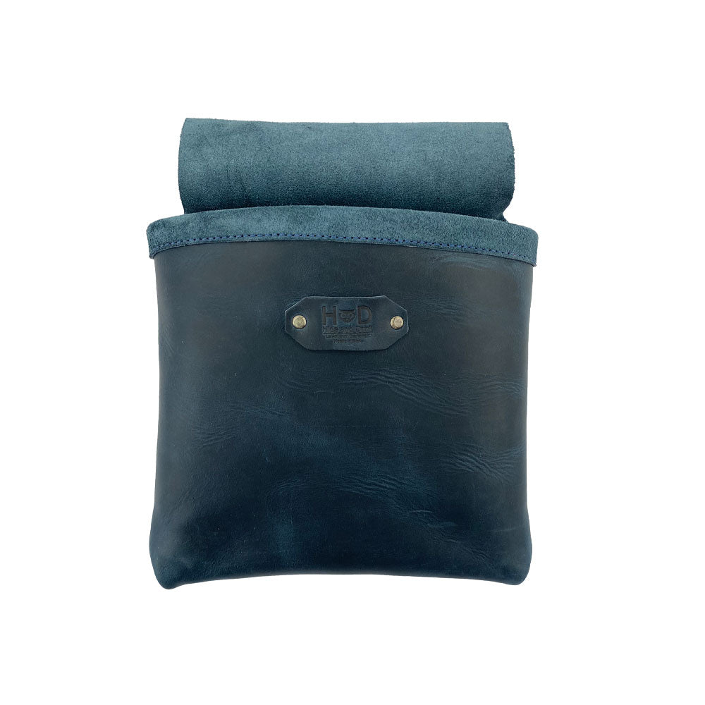 Front view of the Constructor Belt Bag in slate blue by Hide & Drink, designed for constructors. This tool belt bag includes a single big pocket made from full grain leather and showcases artisan craftsmanship in La Antigua Guatemala & Oaxaca Mexico.