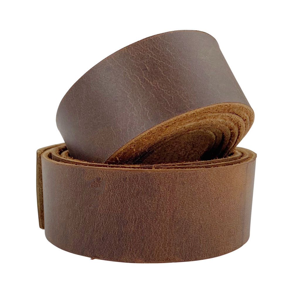 Hide & Drink Leather Strap 1" Wide, 1.8mm Thick made from Full Grain Leather, perfect for crafting. Durable and stylish, this strong strap is ideal for workshops. Features cord braiding string, medium weight, and measures 75 inches long. Hand cut, hand sewn, and fire branded, this artisanal piece is handmade in La Antigua Guatemala & Oaxaca Mexico.