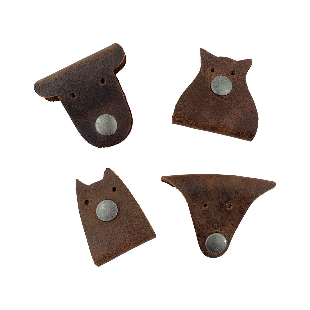 Furry Friends Cord Keeper (4-Pack), featuring lovely animal designs, crafted from high-quality full grain leather by Hide & Drink for stylish cord management. Furry Friends 4-Pack Cord Keeper (Cord Clam), Full Grain Leather, StockyardX, Small Batch Production, Hand Cut, Hand Sewn, Fire Branded, Artisan, Handmade in La Antigua Guatemala & Oaxaca Mexico.