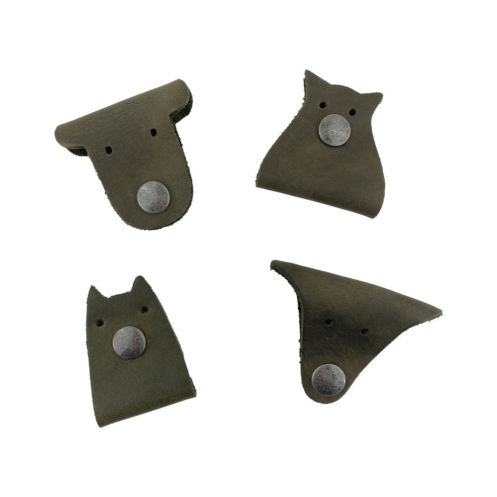 Furry Friends Cord Keeper (4-Pack) showcasing adorable cord holders, made of durable Full Grain Leather by Hide & Drink to keep your cables neat. Furry Friends 4-Pack Cord Keeper (Cord Clam), Full Grain Leather, StockyardX, Small Batch Production, Hand Cut, Hand Sewn, Fire Branded, Artisan, Handmade in La Antigua Guatemala & Oaxaca Mexico.