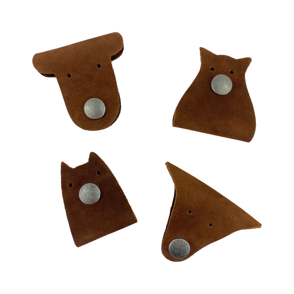 Furry Friends Cord Keeper (4-Pack) featuring cute designs of animals, crafted from Full Grain Leather by Hide & Drink, perfect for organizing cables. Furry Friends 4-Pack Cord Keeper (Cord Clam), Full Grain Leather, StockyardX, Small Batch Production, Hand Cut, Hand Sewn, Fire Branded, Artisan, Handmade in La Antigua Guatemala & Oaxaca Mexico.