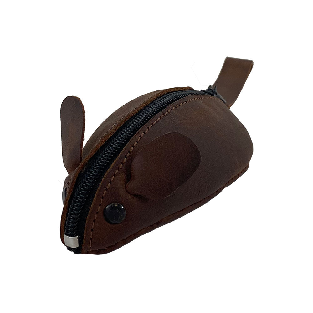 The Hide & Drink Mouse Coin Pouch is a unique, mouse-shaped coin purse made from full grain leather, perfect for keeping loose change organized. This fun and durable change pouch makes an ideal travel accessory or pocket case for coins. Each pouch is handcrafted in La Antigua Guatemala, featuring artisan techniques like hand cutting and sewing, ensuring quality in small batch production.