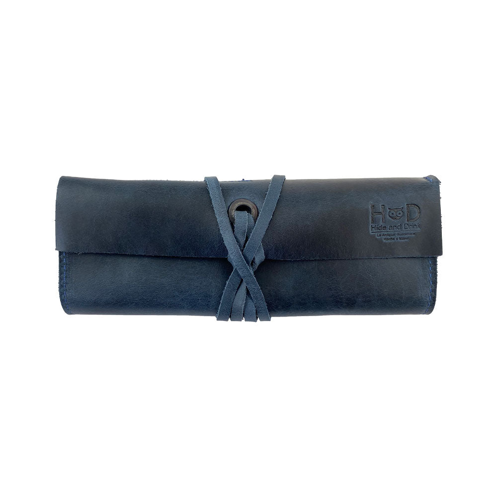 Hide & Drink Multi Purpose Pencil Roll featuring the practical storage layout, emphasizing a rustic design. Handmade from full grain leather, this pouch serves various organizing needs, from craft supplies to work tools.