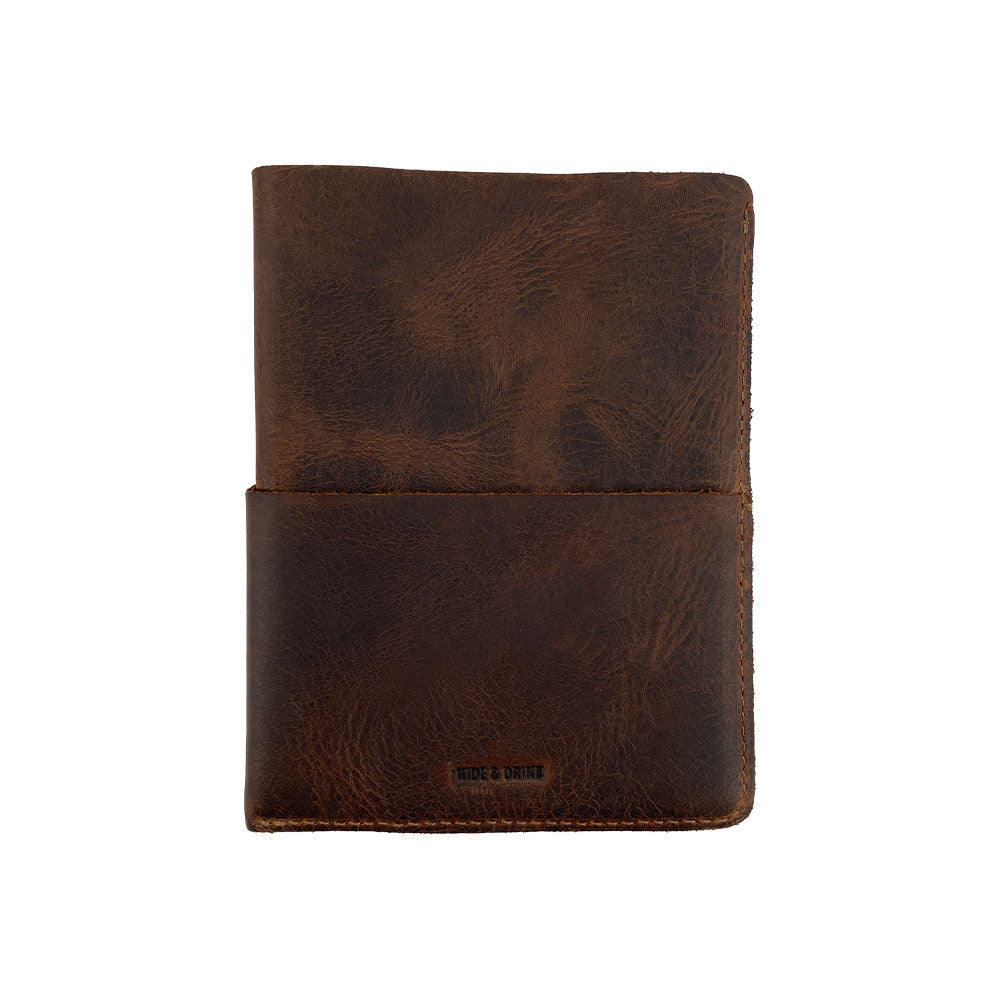 Hide & Drink Multi-Tool Pocket Sleeve showcasing a rustic leather design, perfect as a Rustic Multitool Pocket Pouch, Classic Multipurpose Bag, and Compact Organizer. Ideal for camping accessories made of Full Grain Leather through small batch production, hand cut, hand sewn, and fire branded by artisans in La Antigua Guatemala & Oaxaca Mexico.