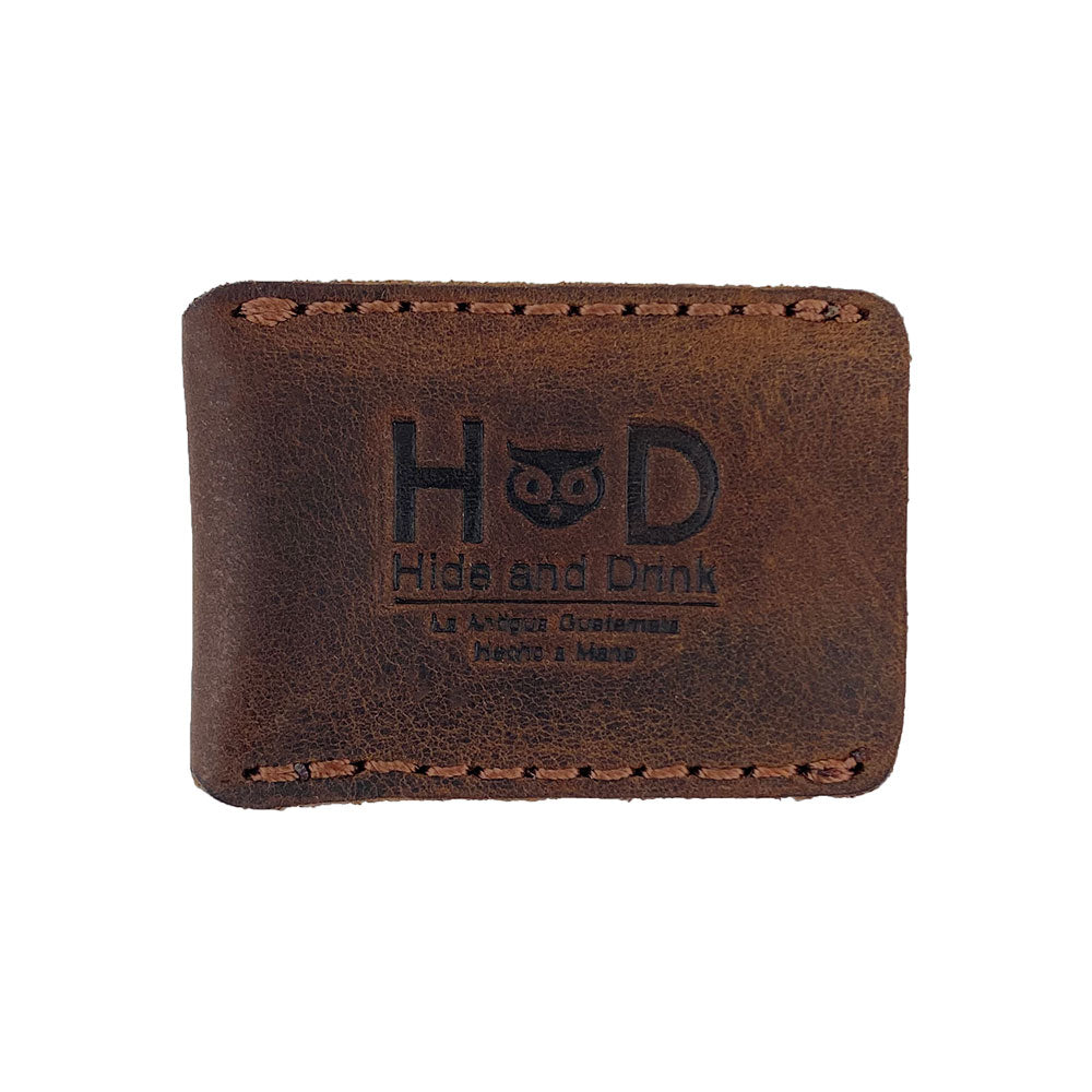 Hide & Drink Razor Head Cover crafted from full grain leather, featuring a protective sheath for double edge safety razors. This artisan handmade product offers a perfect shaving travel cover, highlighting small batch production in La Antigua Guatemala & Oaxaca Mexico.