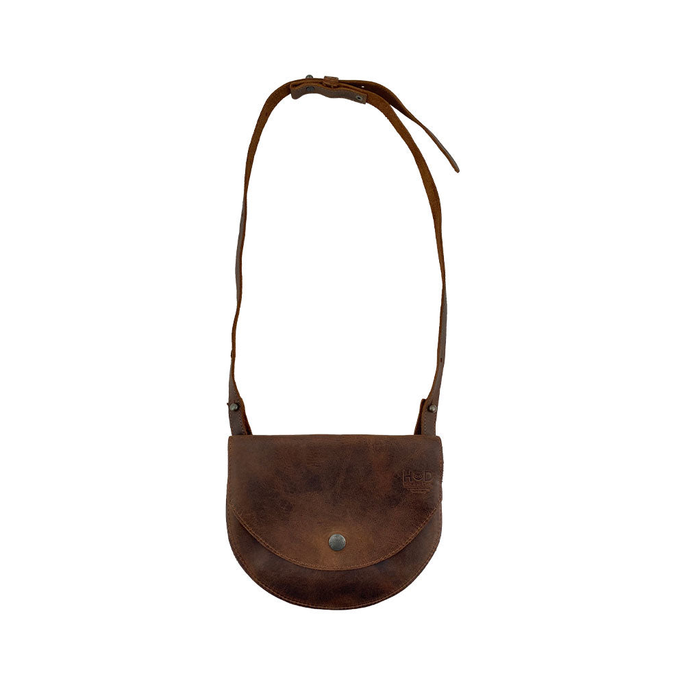 A stylish Hip and Shoulder Bag by Hide & Drink made from Full Grain Leather, showcasing its artisan craftsmanship from Small Batch Production. This handcrafted piece is hand cut, hand sewn, and fire branded, embodying the essence of quality in every detail. Handmade in La Antigua Guatemala & Oaxaca Mexico.