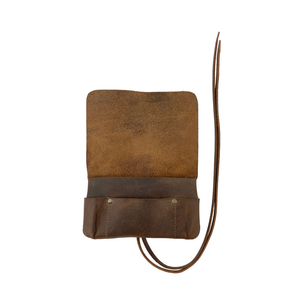 Hide & Drink Tobacco Pouch showcased with a stylish design, perfect as a smoking accessories and notebook cover, made from full grain leather in small-batch production, handmade in La Antigua Guatemala.