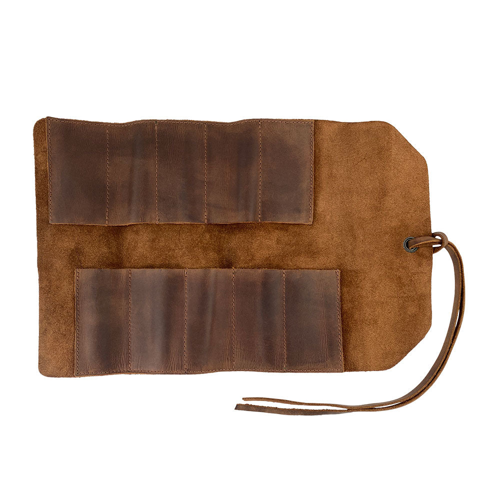Hide & Drink Tool Roll, a rustic small tool roll-up bag with 10 slots, showcasing a handmade design crafted from full grain leather. Ideal as a portable carry-on pouch for woodworking tools, perfect for any workshop storage needs. This artisan bag is hand cut and hand sewn in La Antigua Guatemala & Oaxaca Mexico, incorporating vintage aesthetics with durable waxed canvas options.