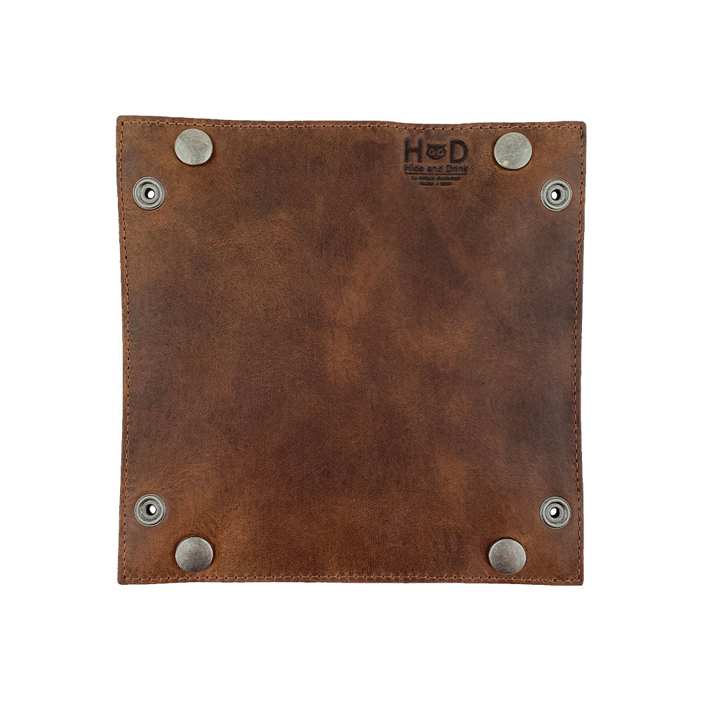 Handmade Valet Tray with Sheep Skin by Hide & Drink, featuring rustic brass snaps and crafted from full grain leather and sheepskin. Ideal for keys, change, and personal items, this catchall combines functionality with artisanal quality. Perfect for home and travel essentials, this tray embodies small batch production with hand cut and hand sewn techniques, fire branded for authenticity and style.