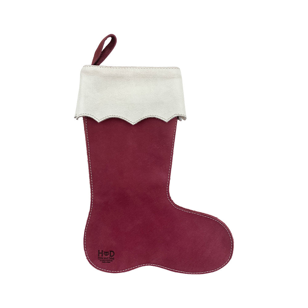 Hide & Drink's festive Christmas Stocking Boot in a vibrant red and creamy white color combination. This unique stocking is made from premium Full Grain Leather and designed to add flair as Traditional Santa Stocking Decorations.