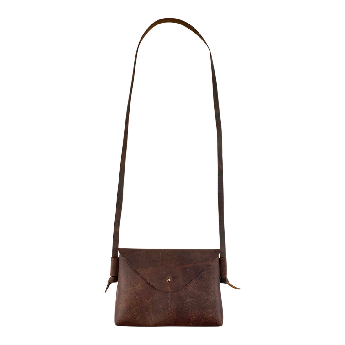 Stylish Horizontal Shoulder Bag by Hide & Drink made from Full Grain Leather, featuring a classic design perfect for everyday use. Hand Cut and Hand Sewn in small batch production by artisans in La Antigua Guatemala & Oaxaca Mexico.