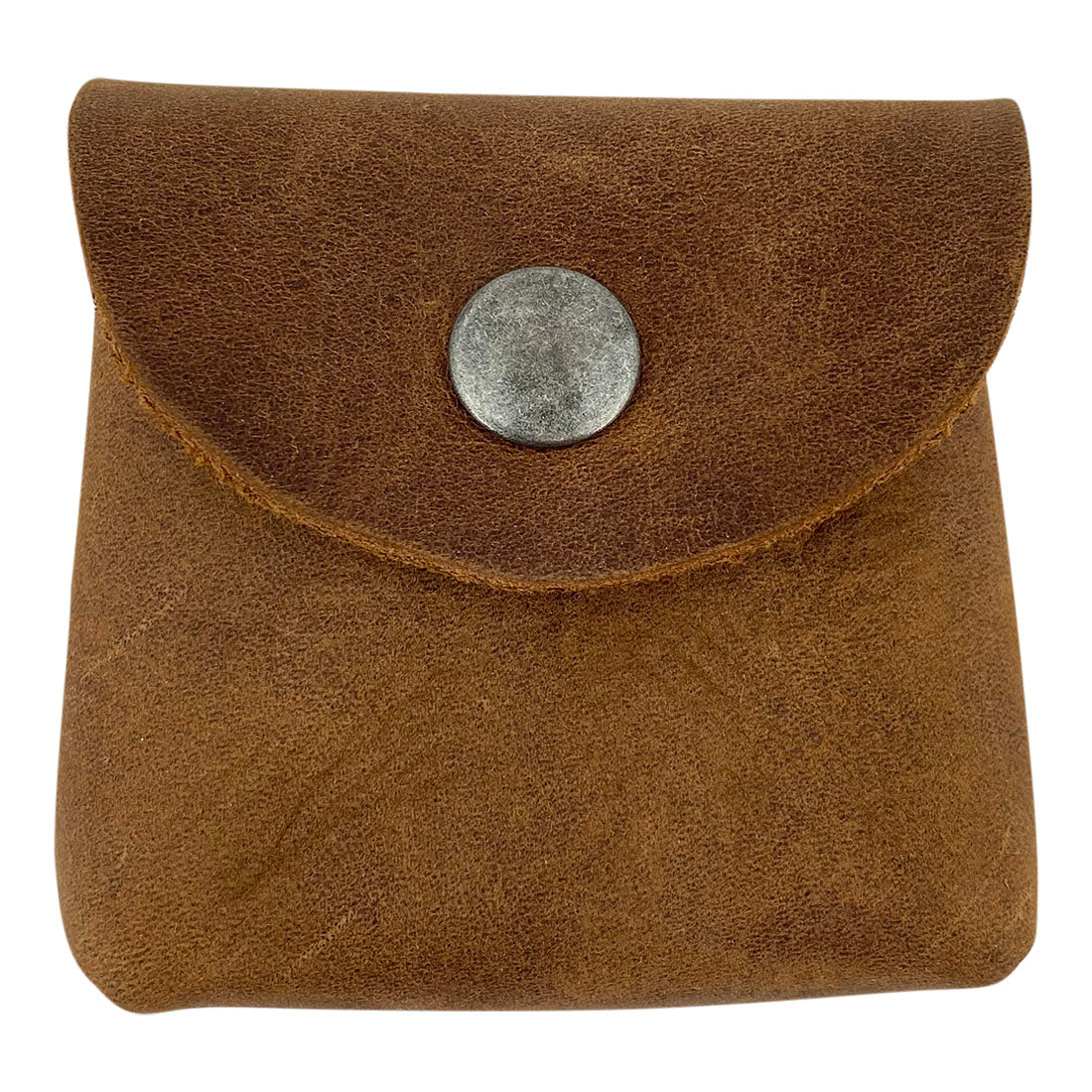 A close-up view of the Vintage Coin Pouch by Hide & Drink, showcasing the soft, full grain leather finish and metal snap closure. Perfect for carrying small valuables, this handmade pouch reflects craftsmanship and style. Cigarette Pack Cover/Holder/Tobacco Case/Accessories, Full Grain Leather, StockyardX, Small Batch Production, Hand Cut, Hand Sewn, Fire Branded, Artisan, Handmade in La Antigua Guatemala & Oaxaca Mexico.