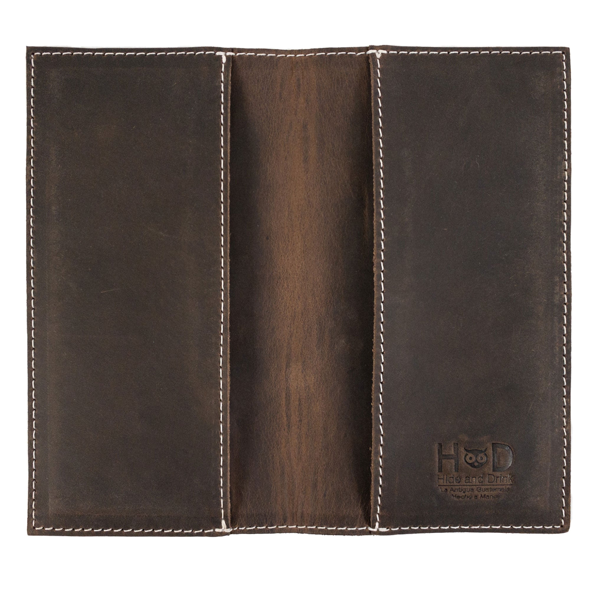 Checkbook Leather Cover by Hide & Drink with a detailed view, perfect as a minimalist organizer for standard checkbooks. This handcrafted item is composed of full grain leather, reflecting artisan quality from La Antigua Guatemala and Oaxaca Mexico through small batch production.