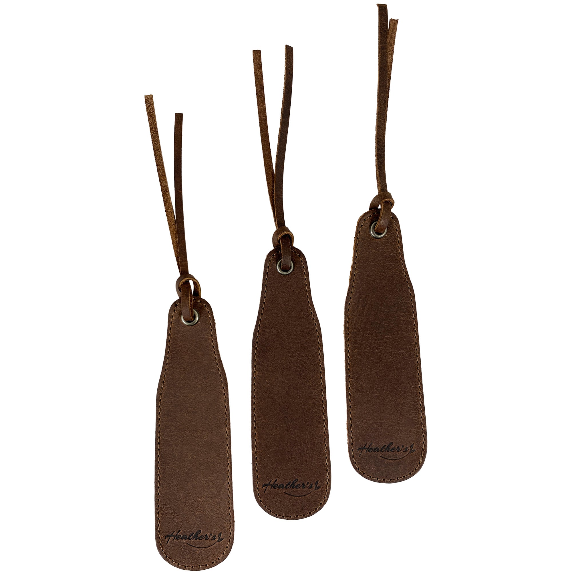 Heather's Bookmark (3 Pack) featuring three handcrafted full grain leather bookmarks, perfect for book lovers, literature fans, and travelers. These artisan page markers are handmade in La Antigua Guatemala and ideal for any book club gift. Bookmark Page Marker (3 Pack) Book Lovers, Page Turners, Travel Readers, Literature Fans, Book Club Gifts, Full Grain Leather, StockyardX, Small Batch Production, Hand Cut, Hand Sewn, Fire Branded, Artisan, Handmade in La Antigua Guatemala & Oaxaca Mexico.