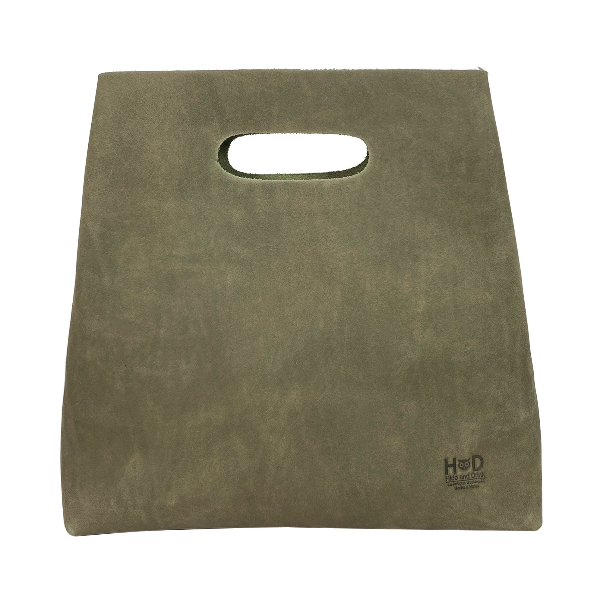 The Minimalist Boho Handbag by Hide & Drink, featuring a sleek design. This Minimalist Handbag for Women made of Full Grain Leather is perfect as a Tote Bag or Rustic Purse for everyday use, showcasing small batch production and artisan craftsmanship. Handmade in La Antigua Guatemala & Oaxaca Mexico.