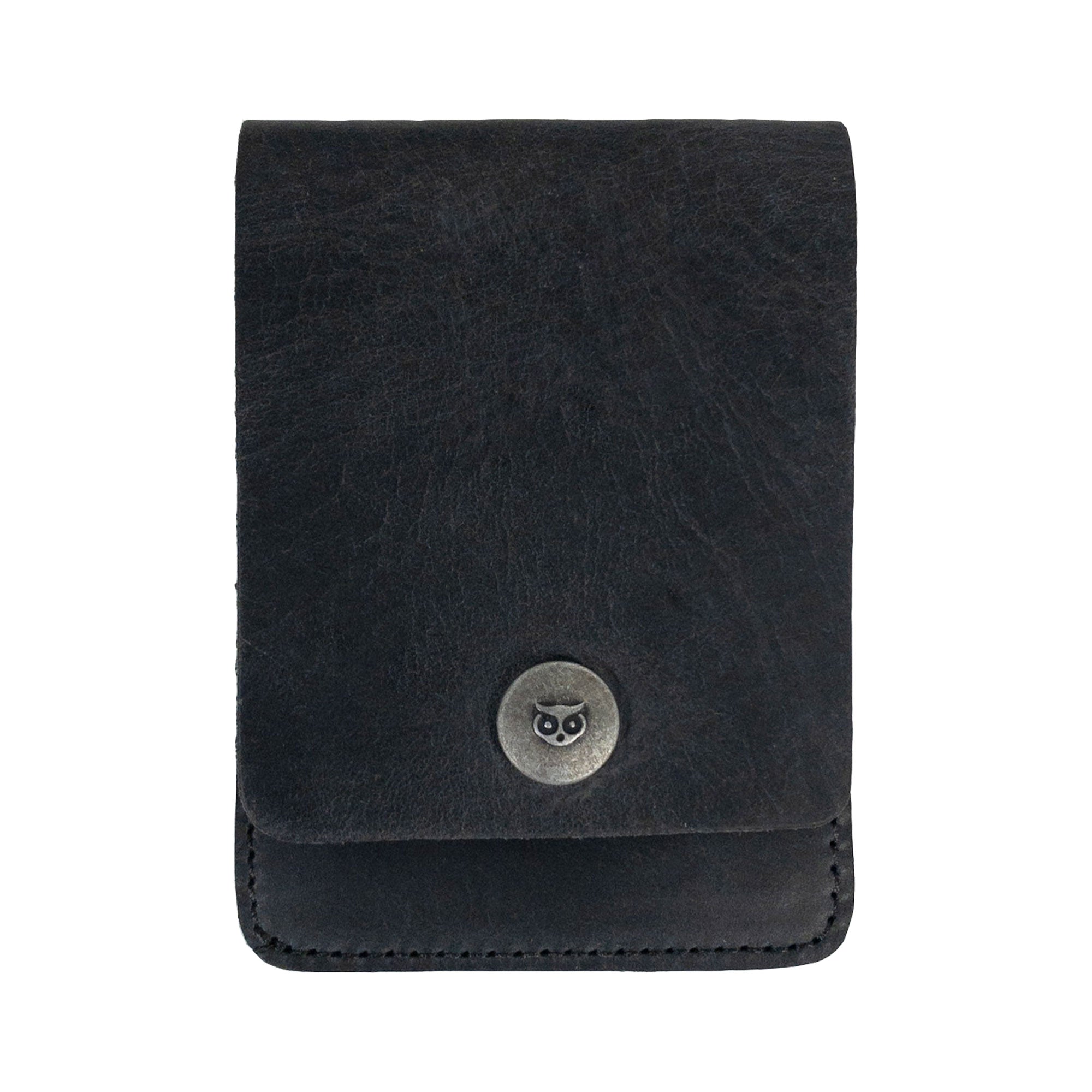Front view of a black variant of the Vertical Wallet by Hide & Drink, showcasing its snap closure. This Vertical Front Pocket Wallet with Card Slot is stylish and functional, providing compact storage for bills and cards, made of durable full grain leather through small batch production techniques, hand cut, hand sewn, and fire branded by artisans. Handmade in La Antigua Guatemala & Oaxaca Mexico.