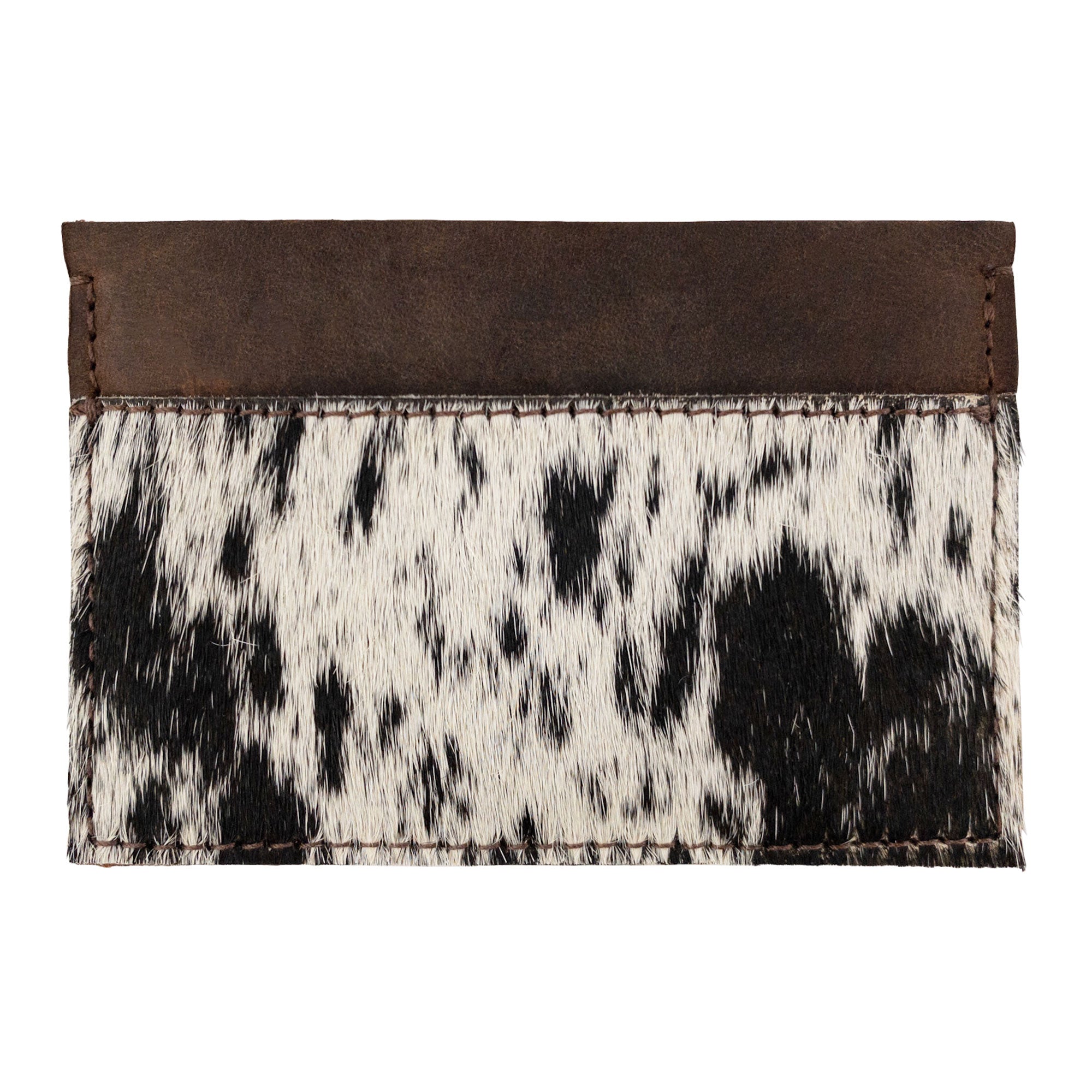 Western Leather Works Double Card Wallet featuring beautifully crafted hair-on-hide full grain leather. This Minimalist Rodeo Wallet offers compact storage, ideal as an ID holder or travel accessory. Handmade in La Antigua Guatemala with a focus on small batch production, hand cut and hand sewn techniques. A fire branded artisan product that combines style with functionality.