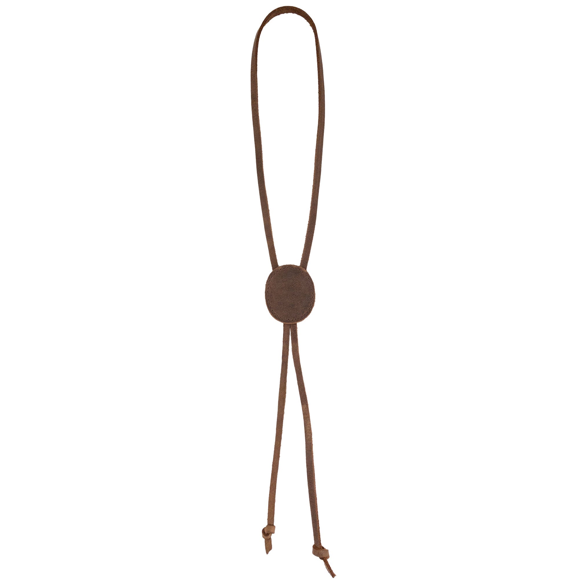 A classic Cowboy Bolo Tie from Western Leather Works showcasing a round shape design, expertly crafted from full grain leather. This artisan handmade accessory is a stylish necktie option, emphasizing small batch production, hand cut, and hand sewn techniques. Made proudly in La Antigua Guatemala & Oaxaca Mexico.