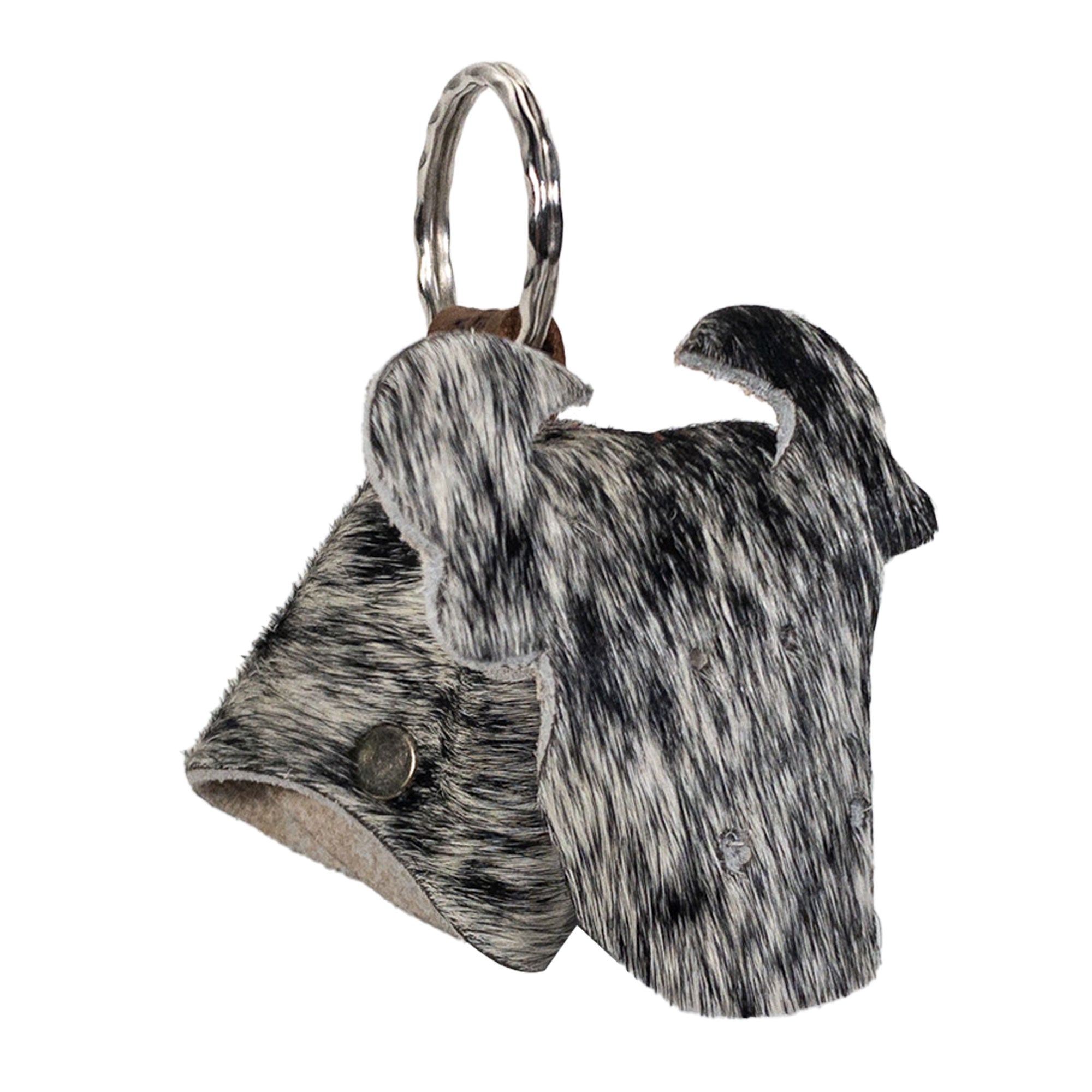 Cow Shape Keychain from Western Leather Works, showcasing a unique handmade design made from Hair-On-Hide Full Grain Leather. This artisan piece features small batch production techniques and has been hand cut and hand sewn, embodying quality craftsmanship. Perfect for carrying keys, this Cow Shape Keychain is a true representation of handmade goods from La Antigua Guatemala and Oaxaca Mexico.