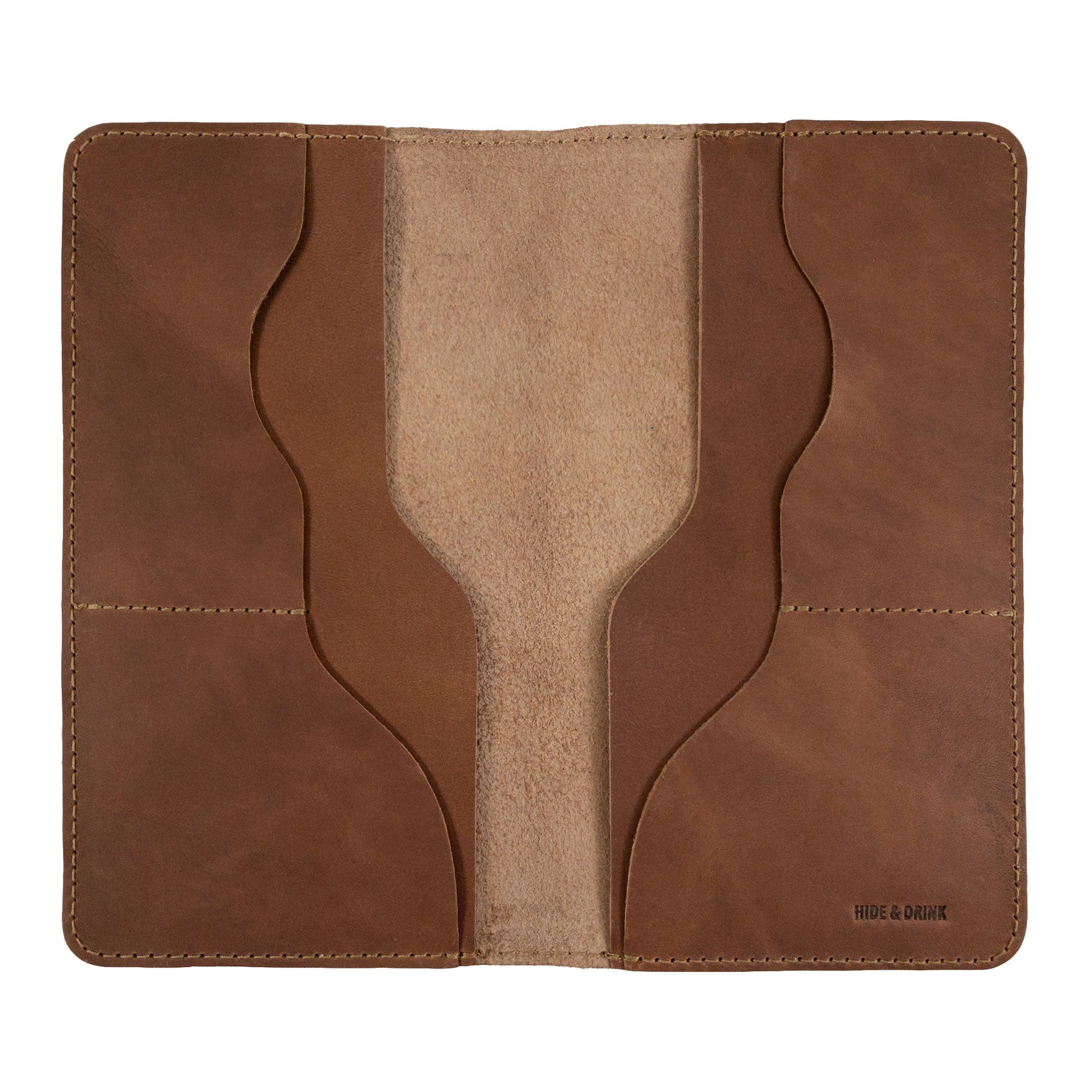 Hide & Drink Large Organizer Wallet in a light leather color, featuring a soft interior. This bifold wallet provides card slots and a flat money holder, representing timeless design and craftsmanship, handmade in La Antigua Guatemala & Oaxaca Mexico.