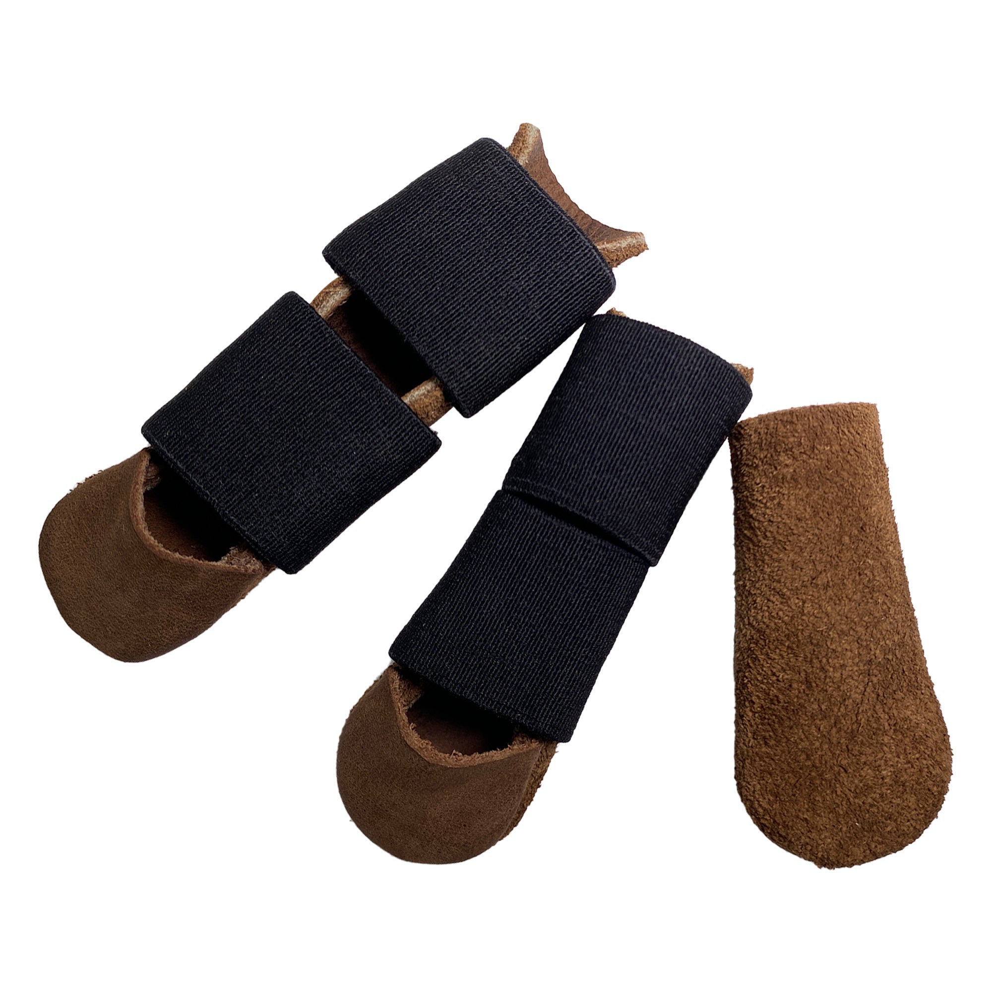 Toolshed Hide Thumb and Finger Guards (3 Pieces) showcasing comfortable protection for fingers, made from full grain leather. Perfect for craftsmen, these handmade guards are part of the StockyardX collection, ensuring small batch production with a focus on quality. Each piece is hand cut, hand sewn, and fire branded, reflecting artisan craftsmanship from La Antigua Guatemala & Oaxaca Mexico.