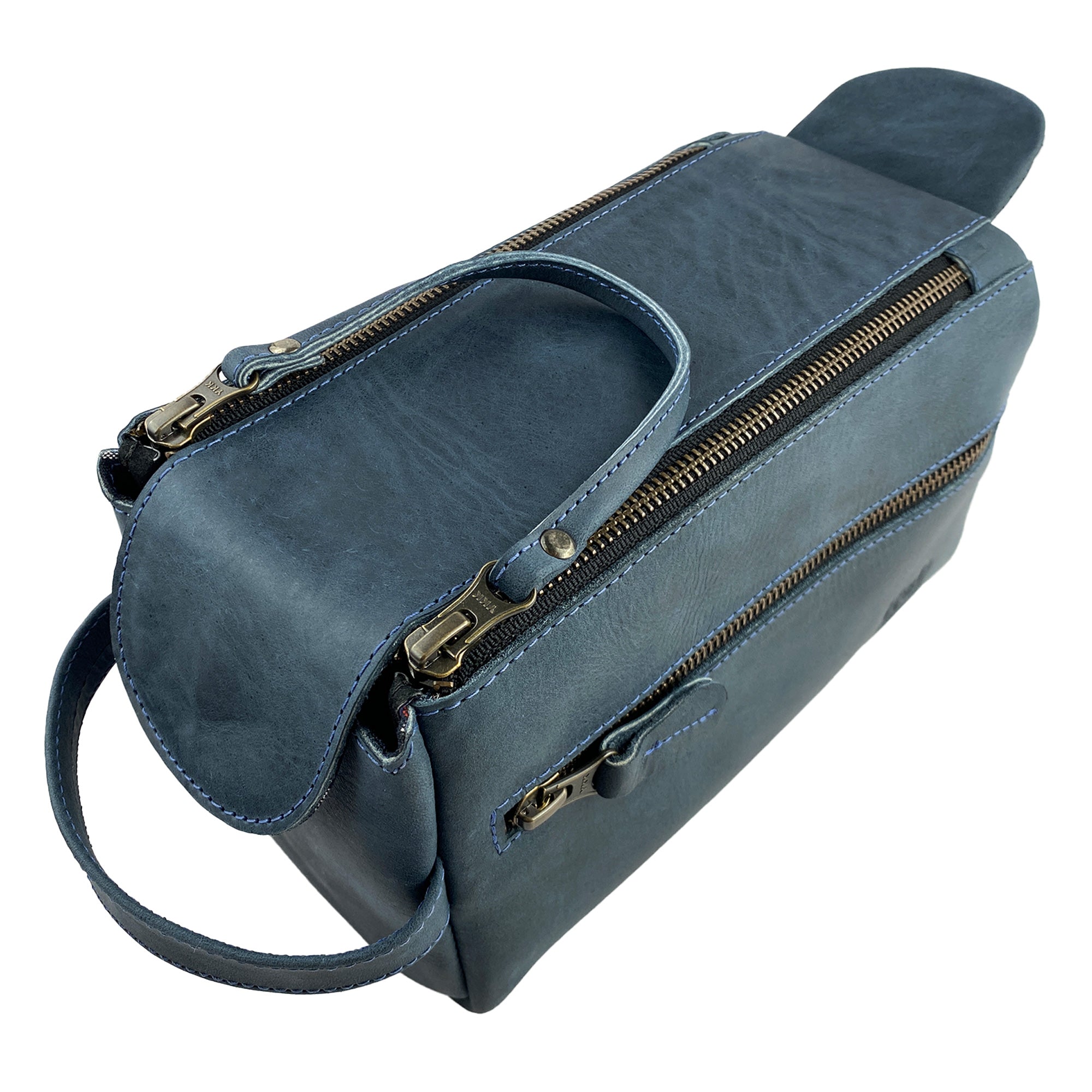 Hide & Drink's Toiletry Bag in new blue leather, showcasing its trendy design. This Full Grain Leather Toiletry Bag is a stylish Hand Bag and perfect Dopp Kit Organizer for your grooming supplies. StockyardX, Handmade, S.