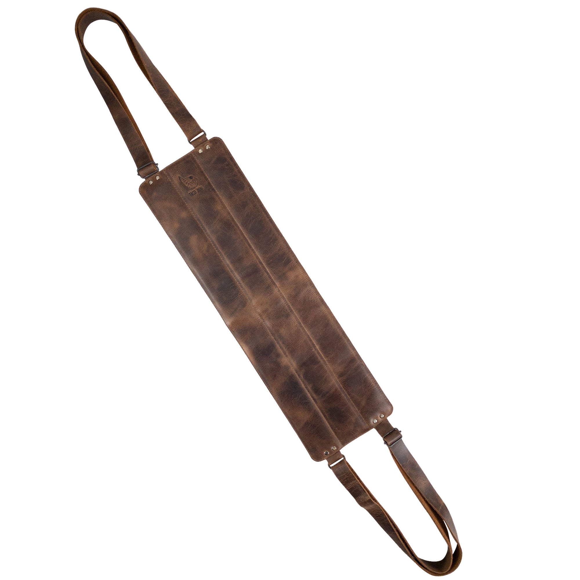 Top view of the Rustic Dog Lift Harness by Taco Dog, showcasing its sturdy build made from Full Grain Leather. This handmade pet rehabilitation support belt is essential for dogs recovering or needing assistance. With small batch production, each piece is hand cut and sewn by skilled artisans. Ideal for a stylish but functional dog accessory, proudly made in La Antigua Guatemala & Oaxaca Mexico.