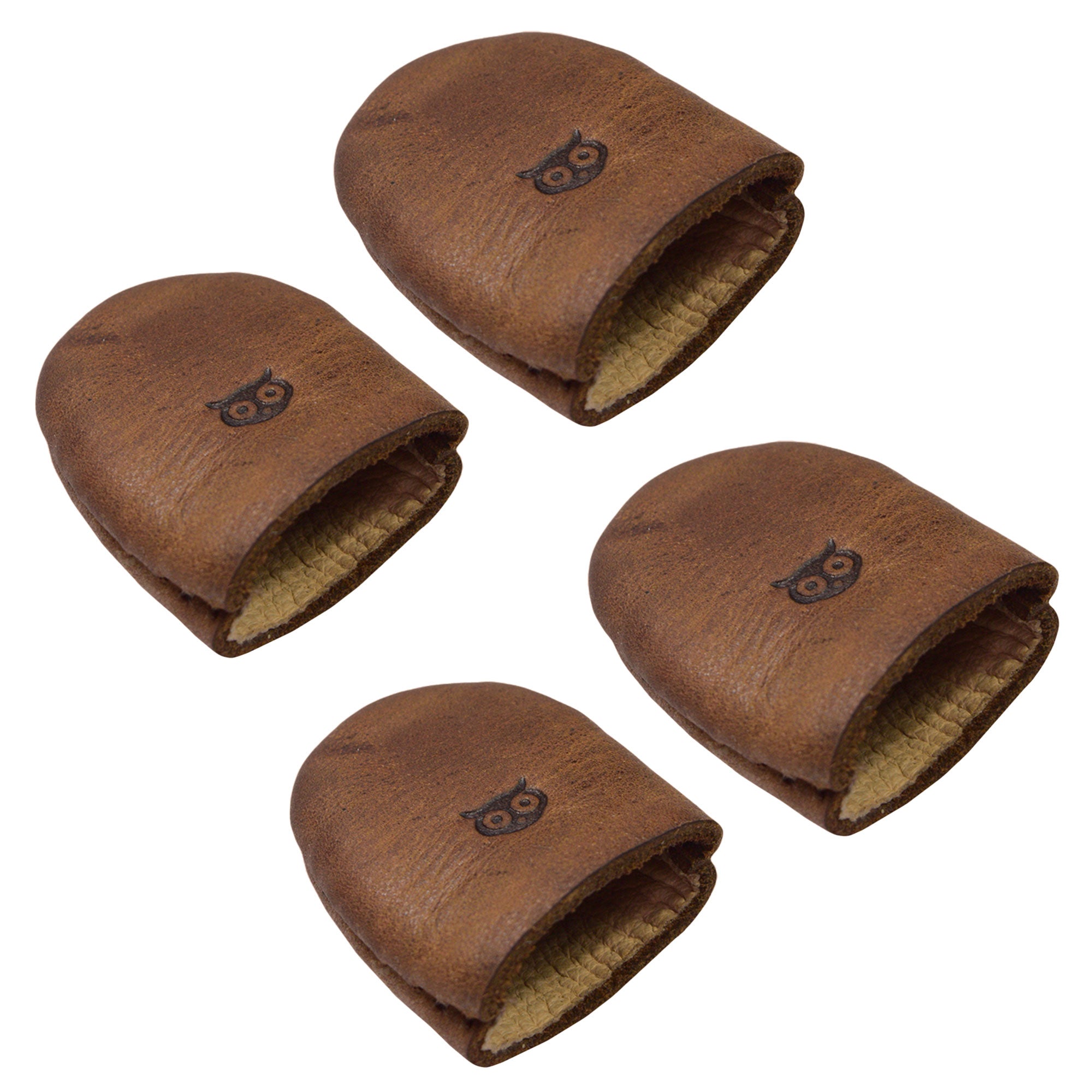 Leather Thimble by Hide & Drink, showcasing a Set of 4 Thimbles designed as Finger Protectors for sewing enthusiasts. A must-have for Hand Applique & EPP, Quilting Embroidery, and other handcraft activities. Crafted from premium Full Grain Leather, featuring Hand Cut and Hand Sewn details, this small batch artisan product is Fire Branded, made thoughtfully in La Antigua Guatemala & Oaxaca Mexico.