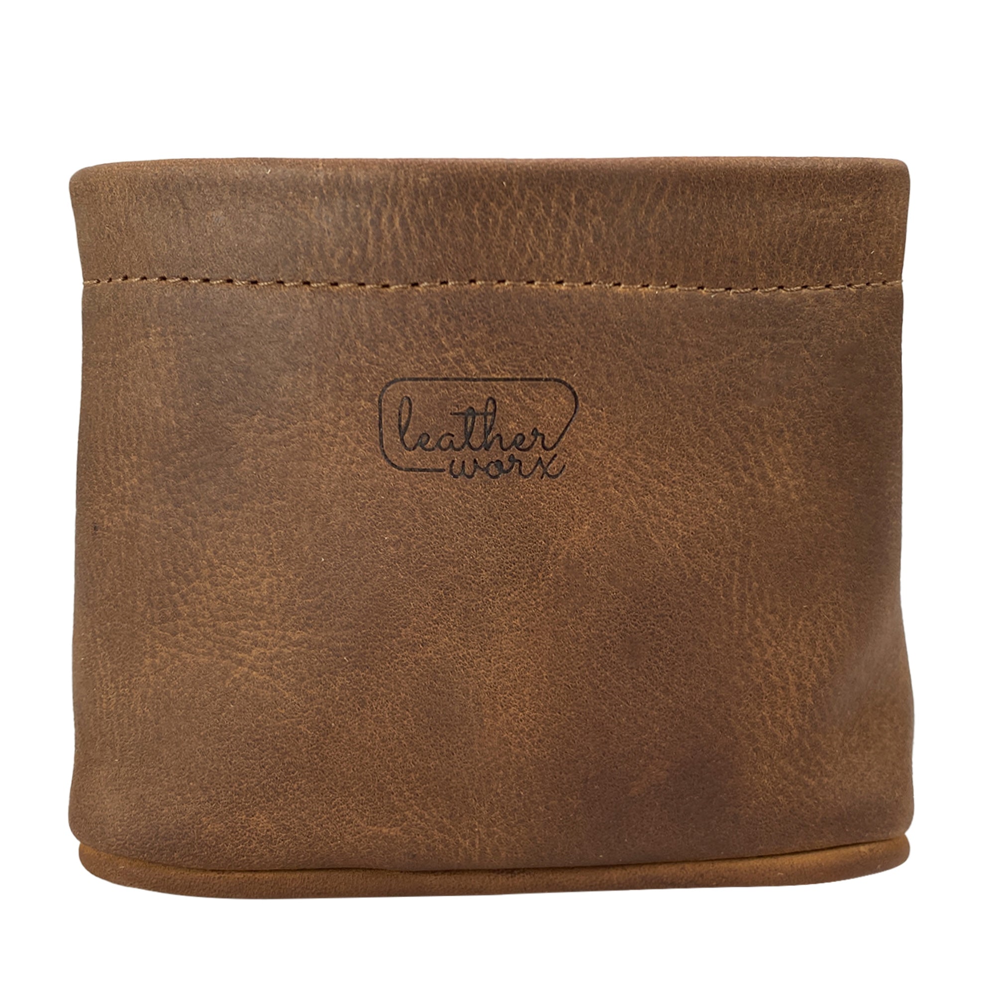 A close-up view of the Leather Worx Desk Organizer Bag revealing its smooth full grain leather exterior, perfect for organizing office supplies. This artisan-crafted Desk Organizer Bag is hand cut and aligned with the tradition of small batch production, ensuring quality and durability, handmade in La Antigua Guatemala & Oaxaca Mexico.