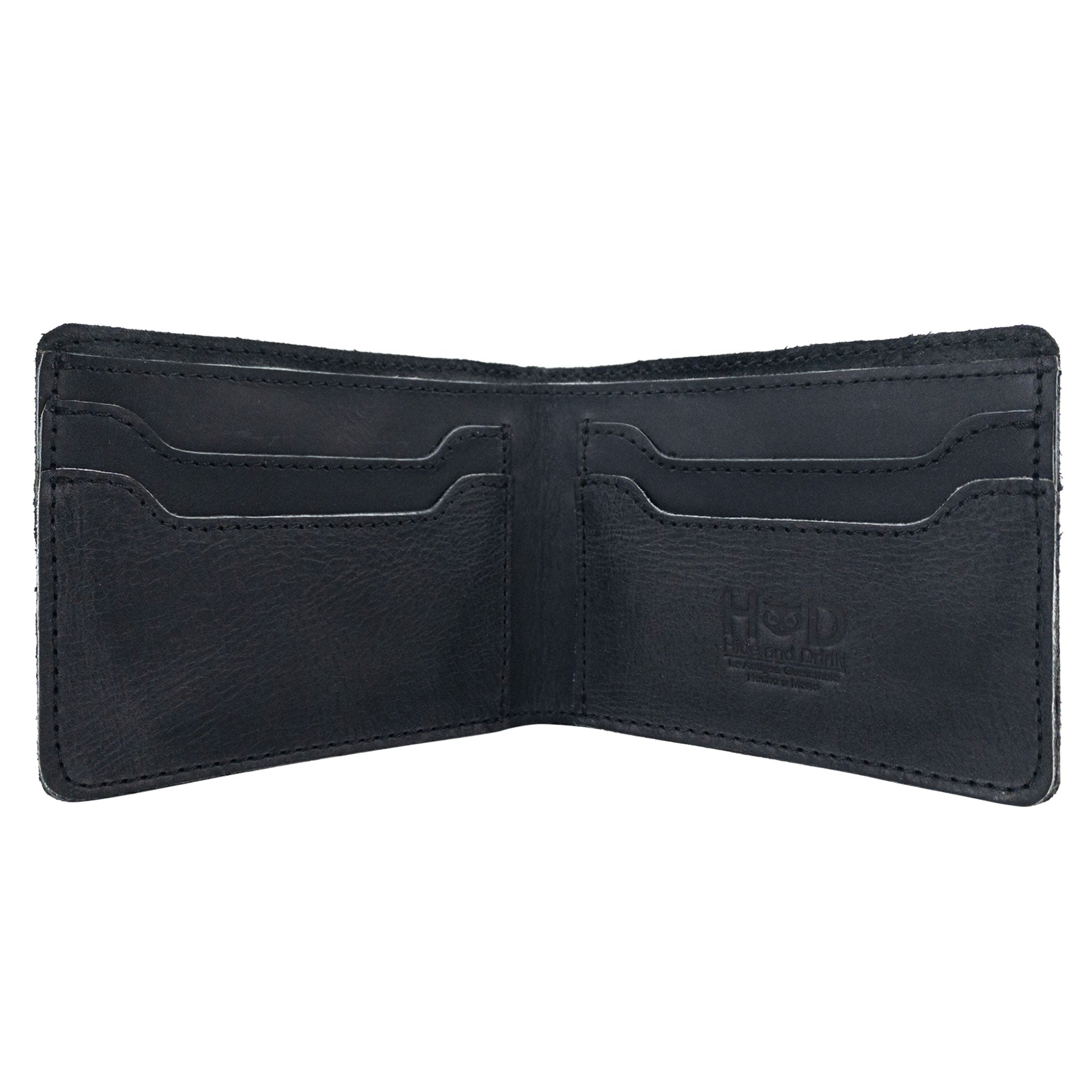 Close-up shot of the dark brown Classic Wallet from Hide & Drink with a visible edge. This Classic Bifold Wallet offers a durable storage case for identification, crafted from Full Grain Leather. Perfect for those on the go, it represents artisan small batch production methods, hand cut and sewn in La Antigua Guatemala & Oaxaca Mexico.