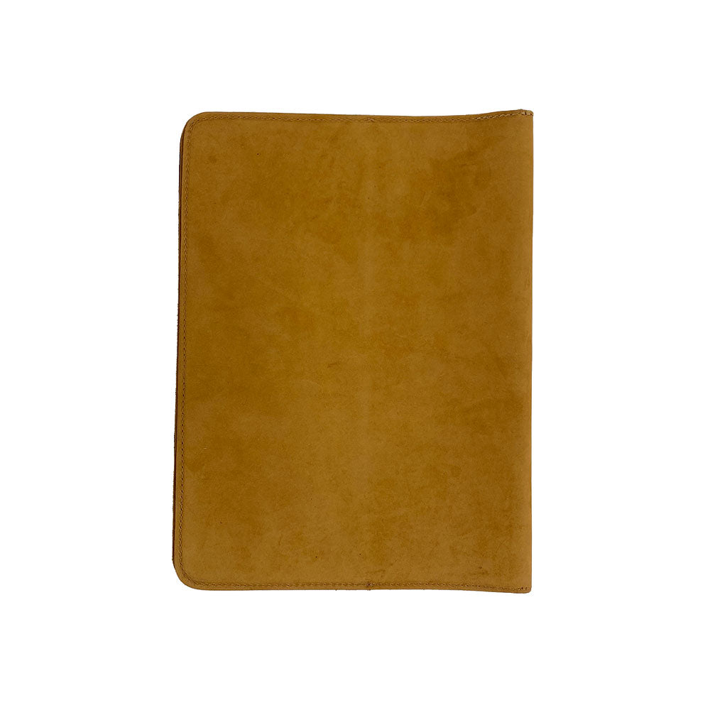 Open view of the russet leather Full Grain Leather Journal Cover for Moleskine Cahier XL (7.5 x 9.75 in.) by Hide & Drink, featuring an attractive bookmark. This notebook sleeve is hand cut and sewn, enhancing any writing experience.
