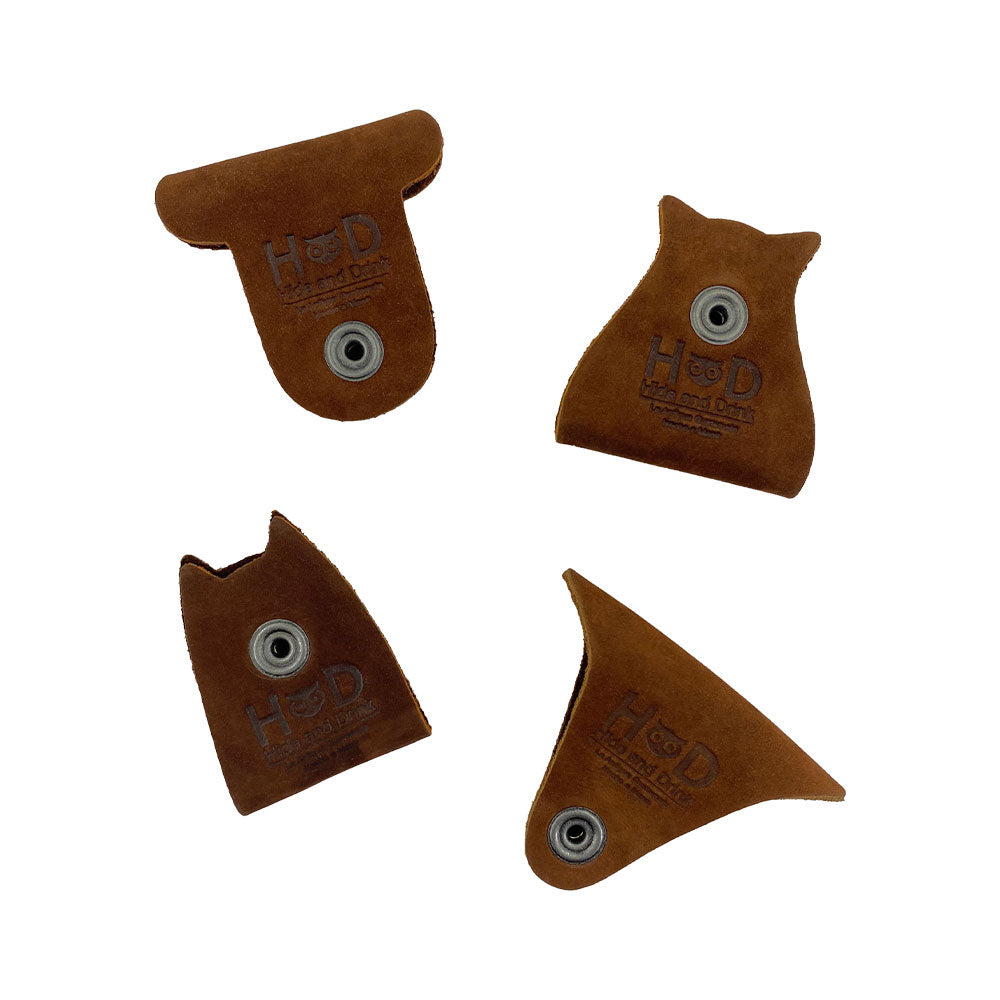 Furry Friends Cord Keeper (4-Pack), showcasing adorable animal shapes, made of high-quality Full Grain Leather by Hide & Drink, ideal for tidy cable management. Furry Friends 4-Pack Cord Keeper (Cord Clam), Full Grain Leather, StockyardX, Small Batch Production, Hand Cut, Hand Sewn, Fire Branded, Artisan, Handmade in La Antigua Guatemala & Oaxaca Mexico.