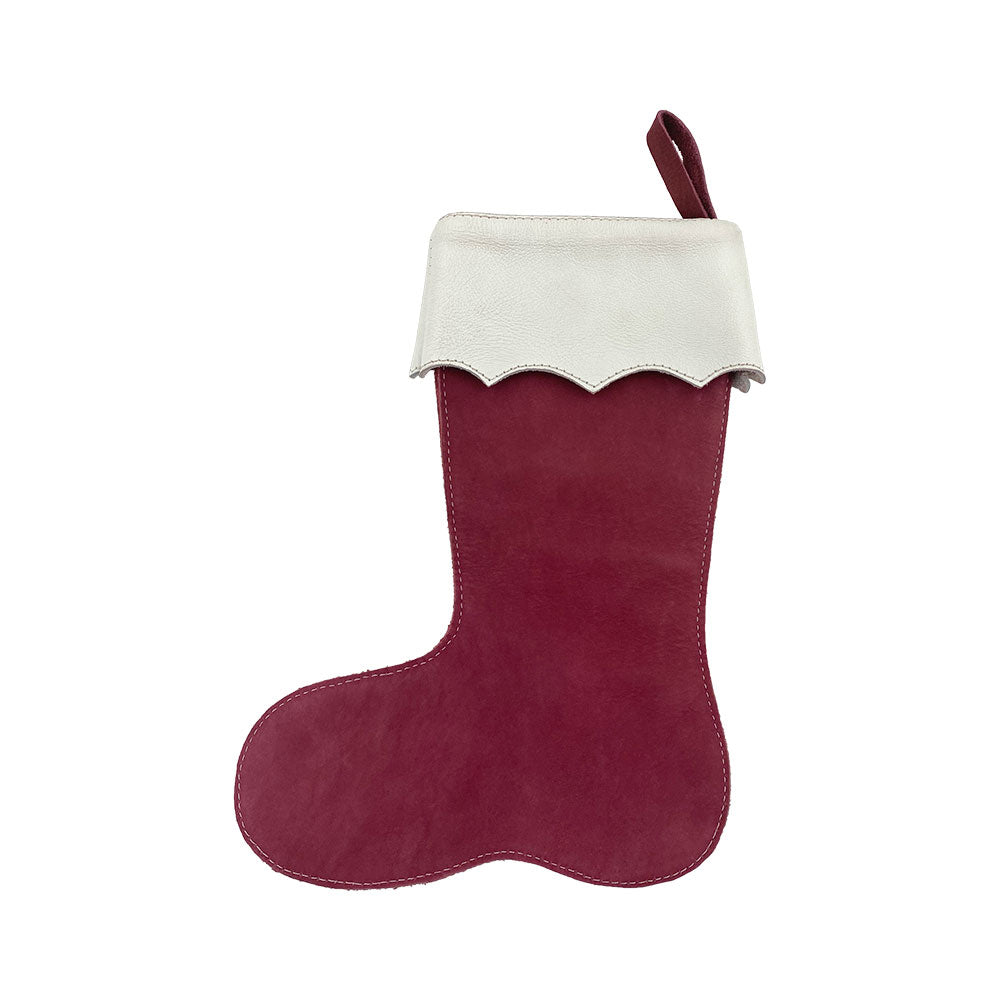 Side view of the red Hide & Drink Christmas Stocking Boot, showcasing its rich leather and elegant design. Ideal as a Traditional Santa Stocking, this artisan-crafted stocking is handmade in La Antigua Guatemala, adding a rustic touch to your Xmas Tree.