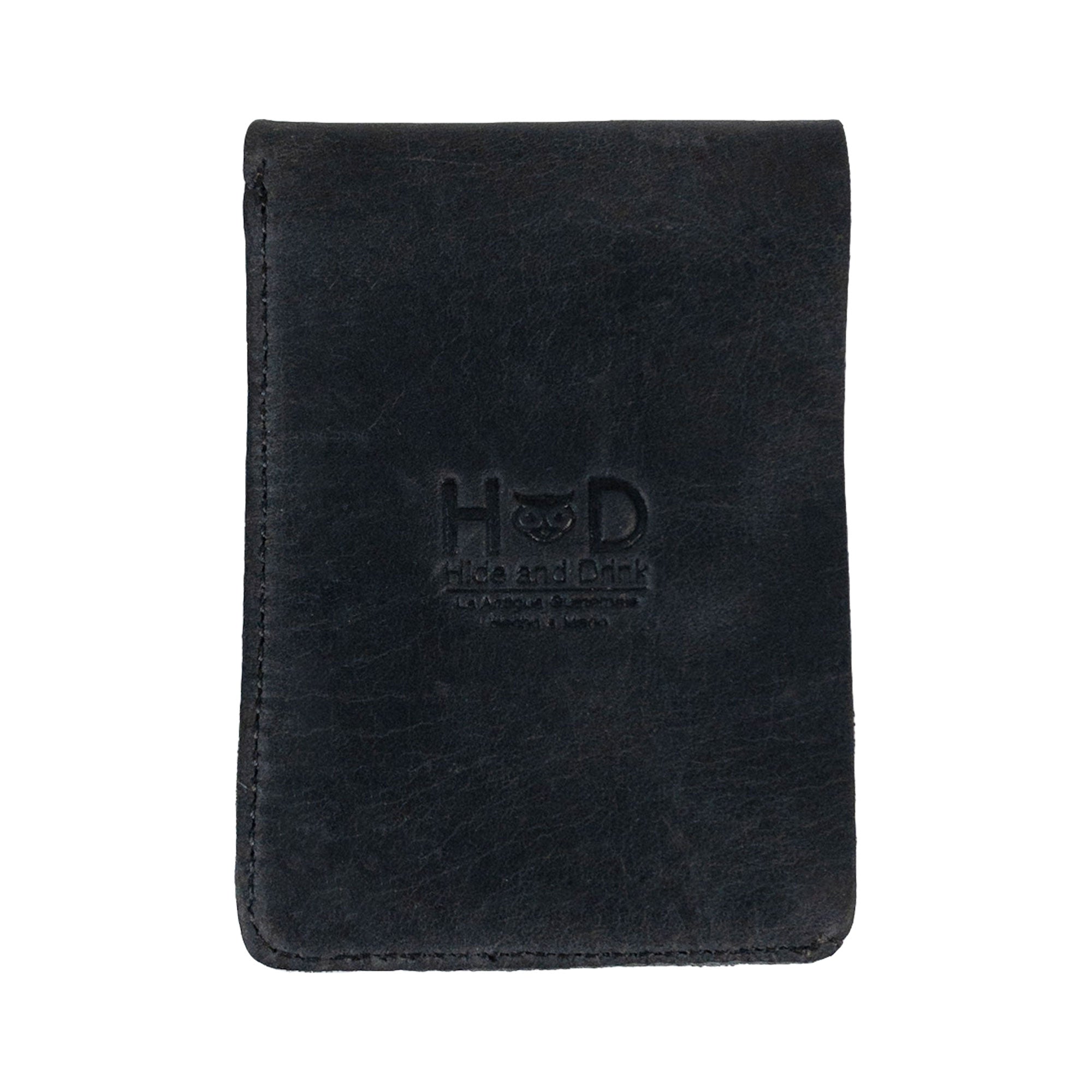 Opened black Vertical Wallet by Hide & Drink displaying card and cash slots, perfect for on-the-go storage. This Vertical Front Pocket Wallet with Card Slot ensures compactness while holding cash, made from full grain leather and emphasizing small batch production with hand cut and hand sewn finishes, fire branded for authenticity. Handmade in La Antigua Guatemala & Oaxaca Mexico.