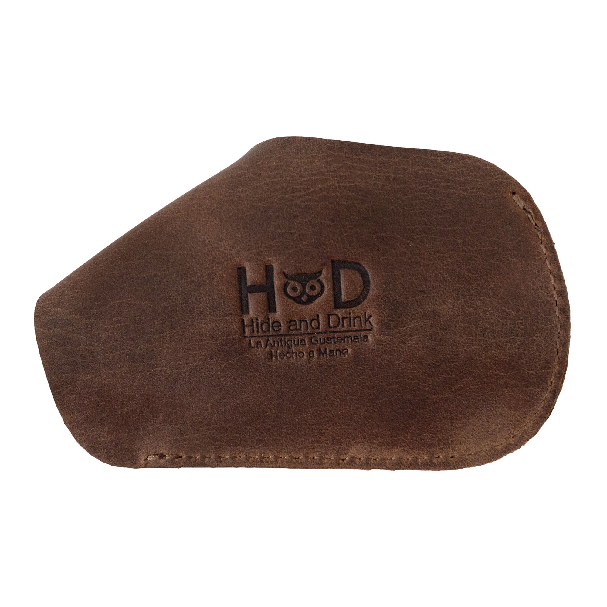 Stylish Golf Club Cover by Hide & Drink, this durable iron head protector is made from full grain leather, showcasing small batch production and artisan craftsmanship. A compact accessory suitable for outdoor use, it's hand cut, hand sewn, and fire branded, making it a perfect gift for golf enthusiasts.