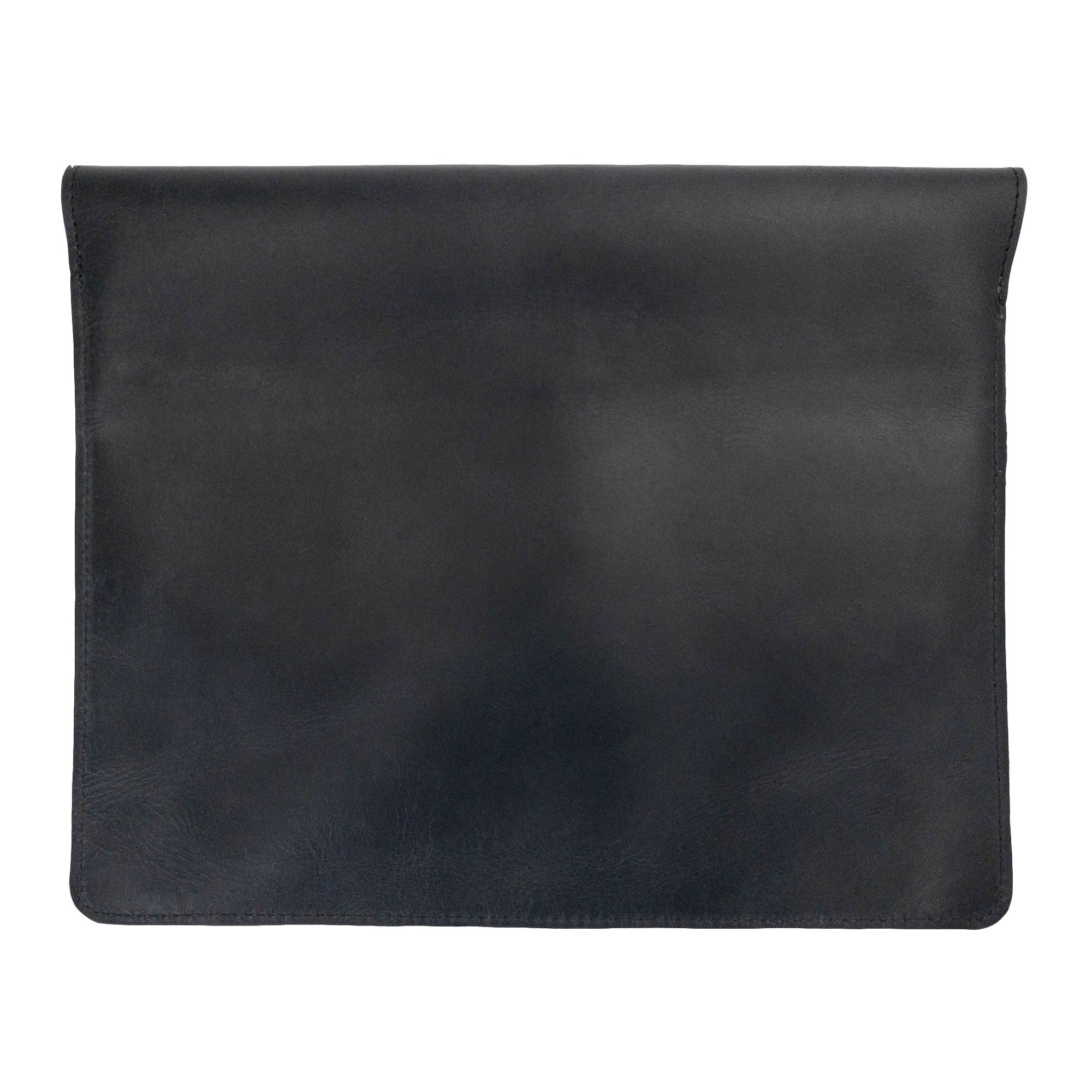 Back view of Hide & Drink's Slim Portfolio in black, showcasing the quality and design of this handmade Flat Messenger Case. This Narrow Document Holder is made from Full Grain Leather, crafted with care in La Antigua Guatemala & Oaxaca Mexico.