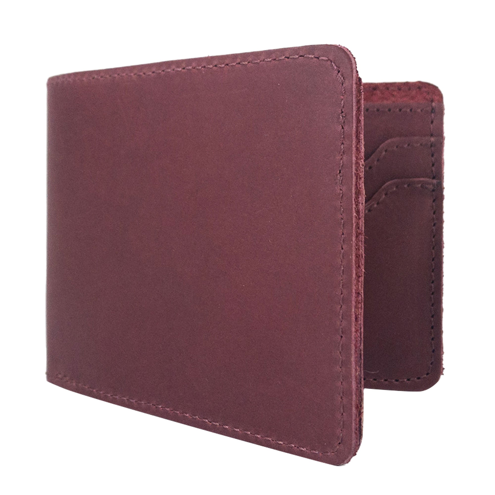 Chic dark brown Classic Wallet by Hide & Drink, showcasing its craftsmanship. This Classic Bifold Wallet made from Full Grain Leather provides a dependable storage case for identification. An essential travel accessory, it exemplifies artisan small batch production techniques, hand cut and sewn in La Antigua Guatemala & Oaxaca Mexico.